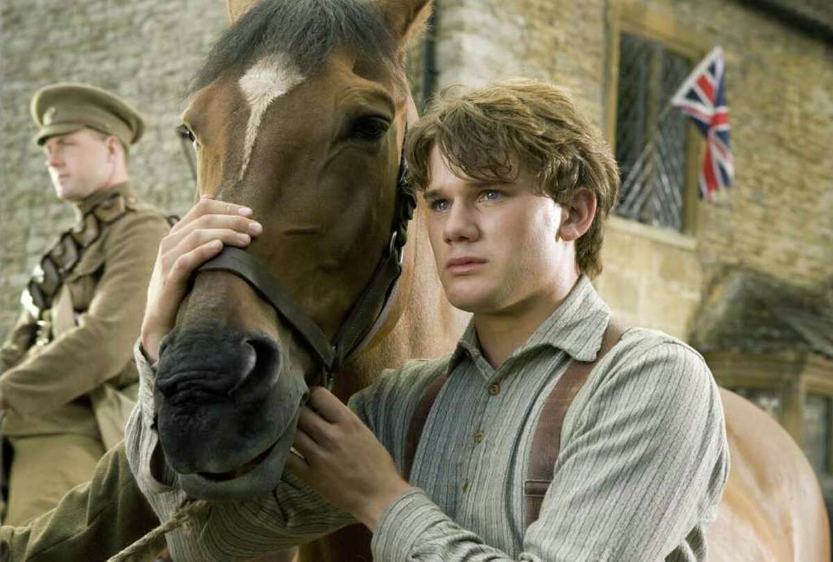 In this film image released by Disney, Jeremy Irvine is shown in a scene from "War Horse." The film was nominated Thursday, Dec. 15, 2011 for a Golden Globe award for best motion picture drama. The Golden Globes will be presented Jan. 15 at the Beverly Hilton Hotel, televised live by NBC and hosted by Ricky Gervais.