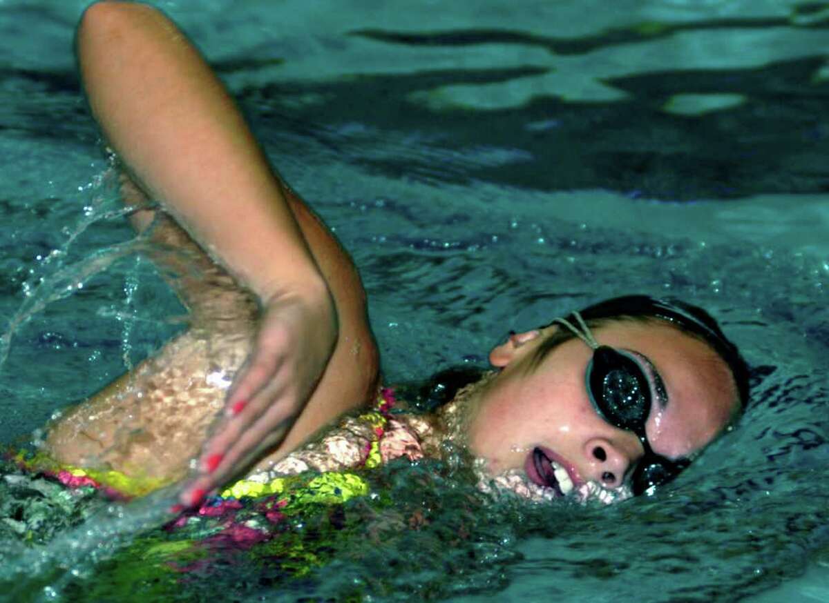SPECTRUM/Jessica Bieber of New Milford High School swimming. December 2011