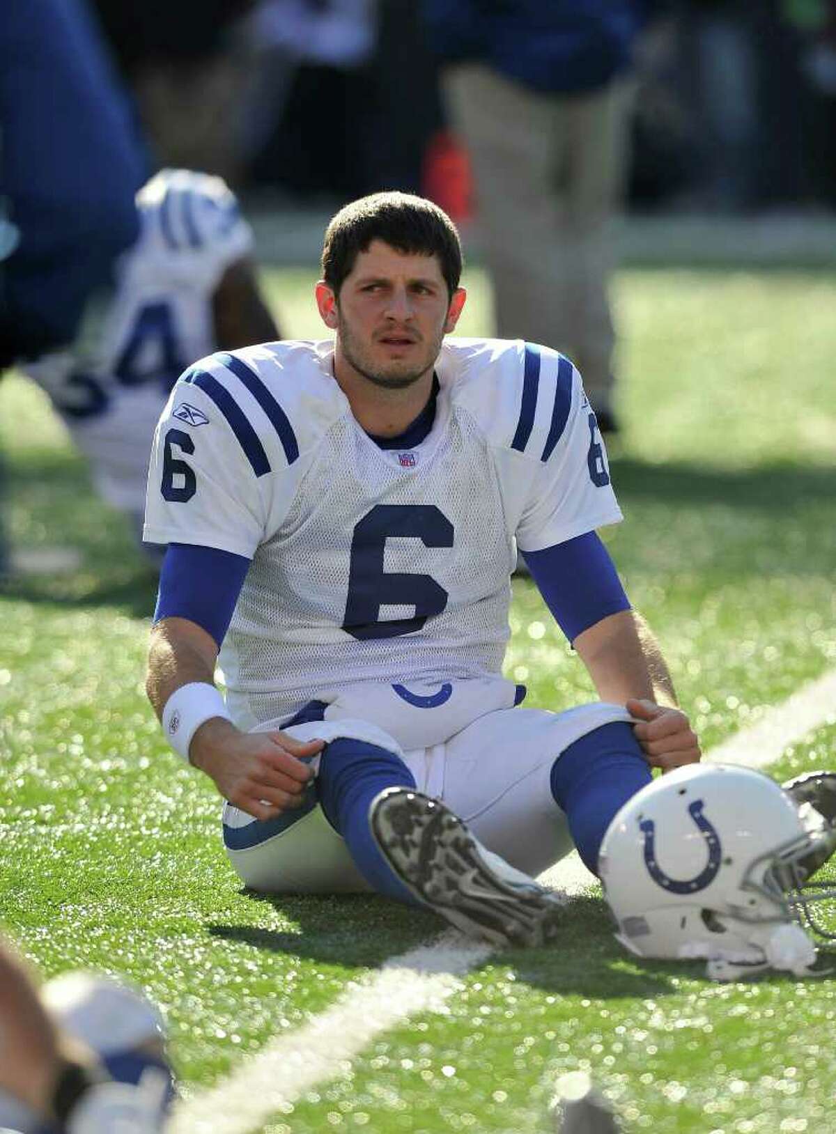 Indianapolis Colts quarterback Dan Orlovsky warms up before an NFL football game against the Baltimore Ravens in Baltimore, Sunday, Dec. 11, 2011. (AP Photo/Gail Burton)