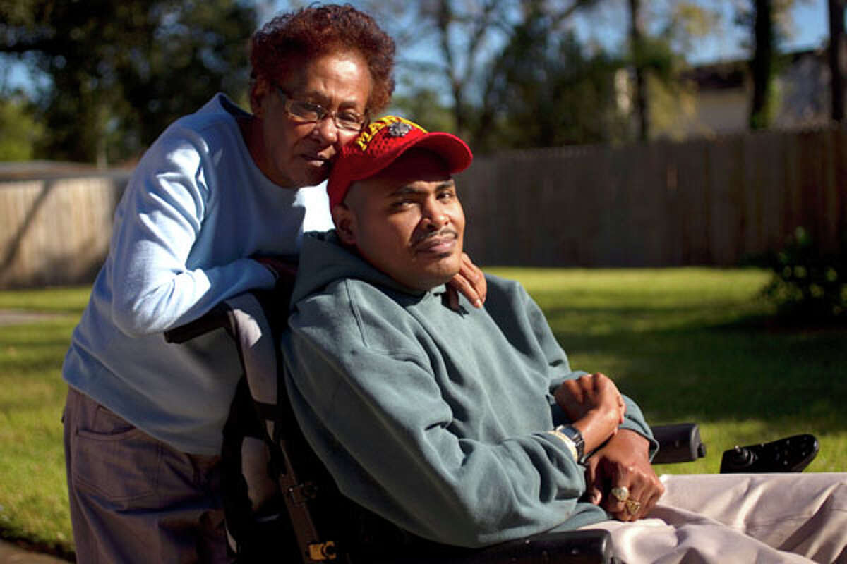 Leland Spencer and his mother Shirley German outside their northeast Houston home in 2010.