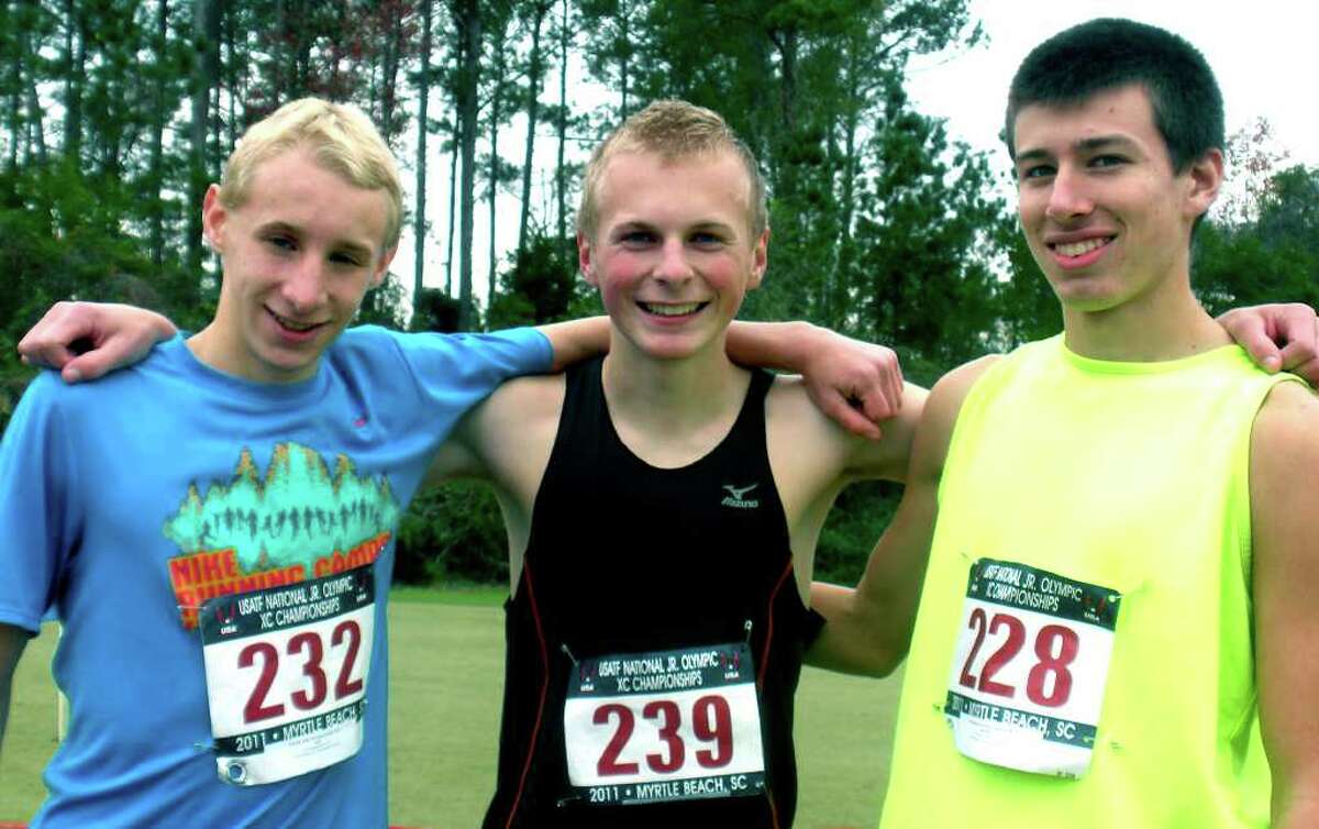 SPECTRUM/The New Milford High School trio of, from left to right, John Hansell, Noah Rossiter and Ryan Clarke, competed Dec. 10 in the national Junior Olympics age-group, cross country championships in Myrtle Beach, S.C. Courtesy of Irene Clarke