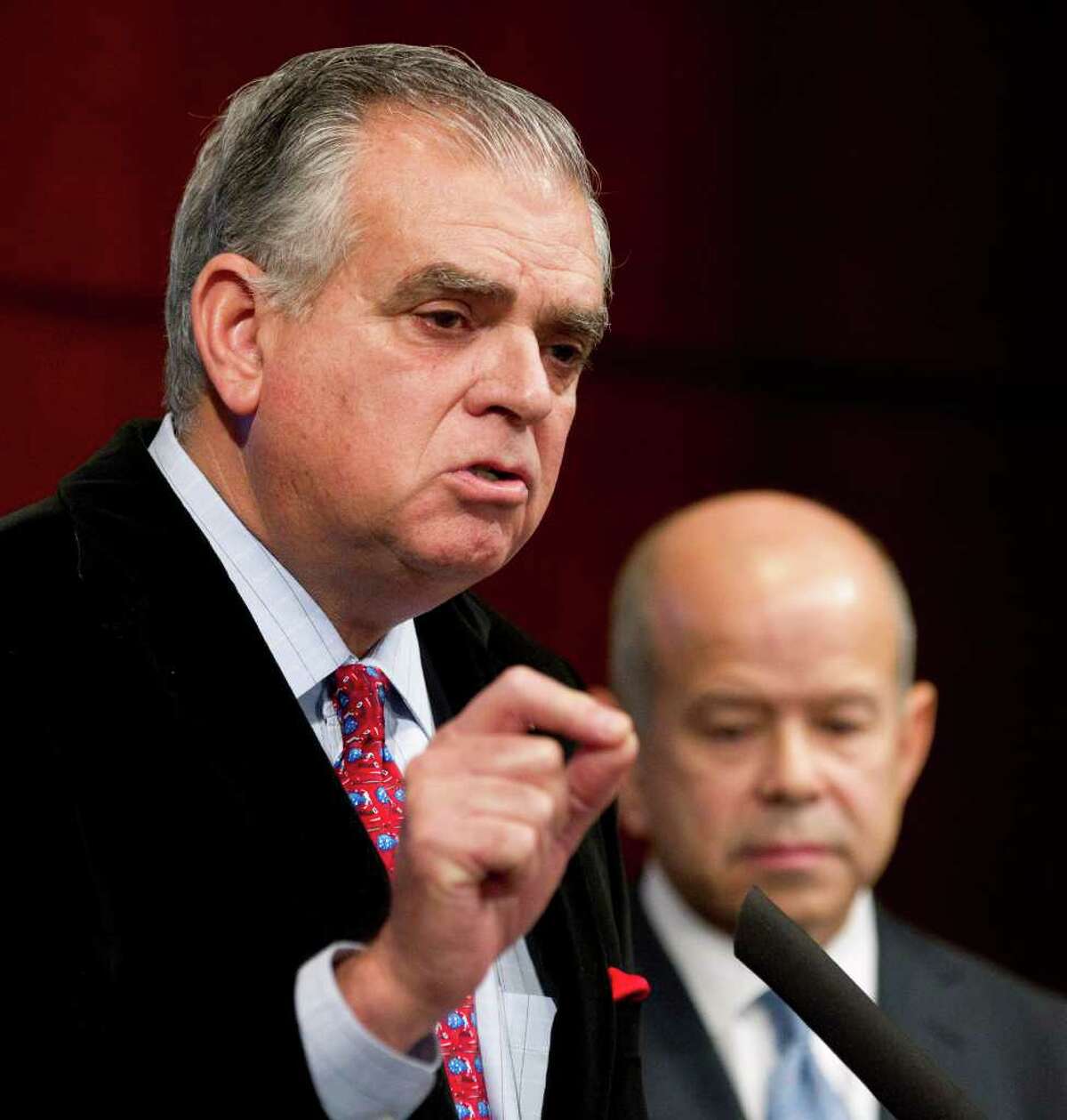 Transportation Secretary Ray LaHood, left, with Federal Aviation Administration Acting Administrator Michael Huerta, speak to reporters during a news conference at the Department of Transportation in Washington, Wednesday, Dec. 21, 2011, announcing a sweeping final rule that overhauls commercial passenger airline pilots scheduling to ensure pilots have a longer opportunity to rest before they enter the cockpit. (AP Photo/Manuel Balce Ceneta)