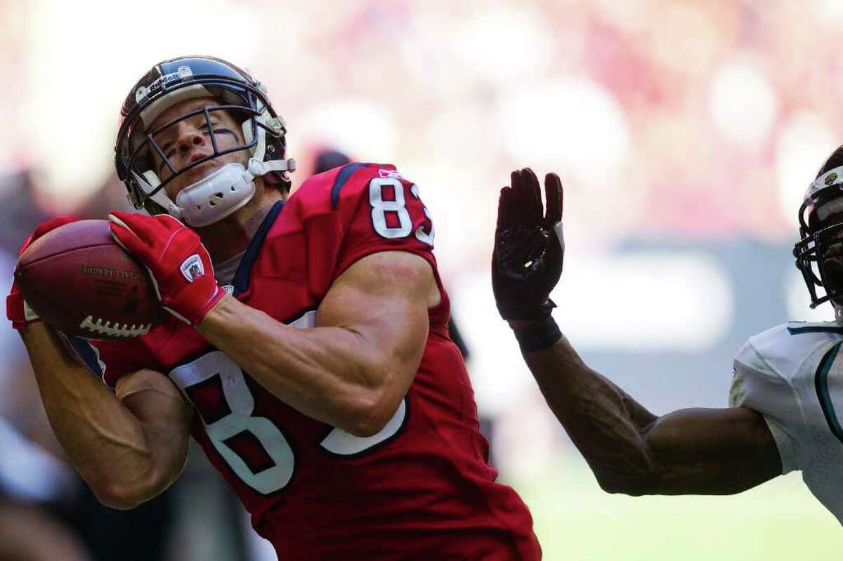 Houston Texans wide receiver Kevin Walter (83) catches a pass along the sideline against the Jacksonville Jaguars during the first quarter at Reliant Stadium on Sunday, Oct. 30, 2011, in Houston. The play was ruled out of bounds on review. ( Smiley N. Pool / Houston Chronicle )