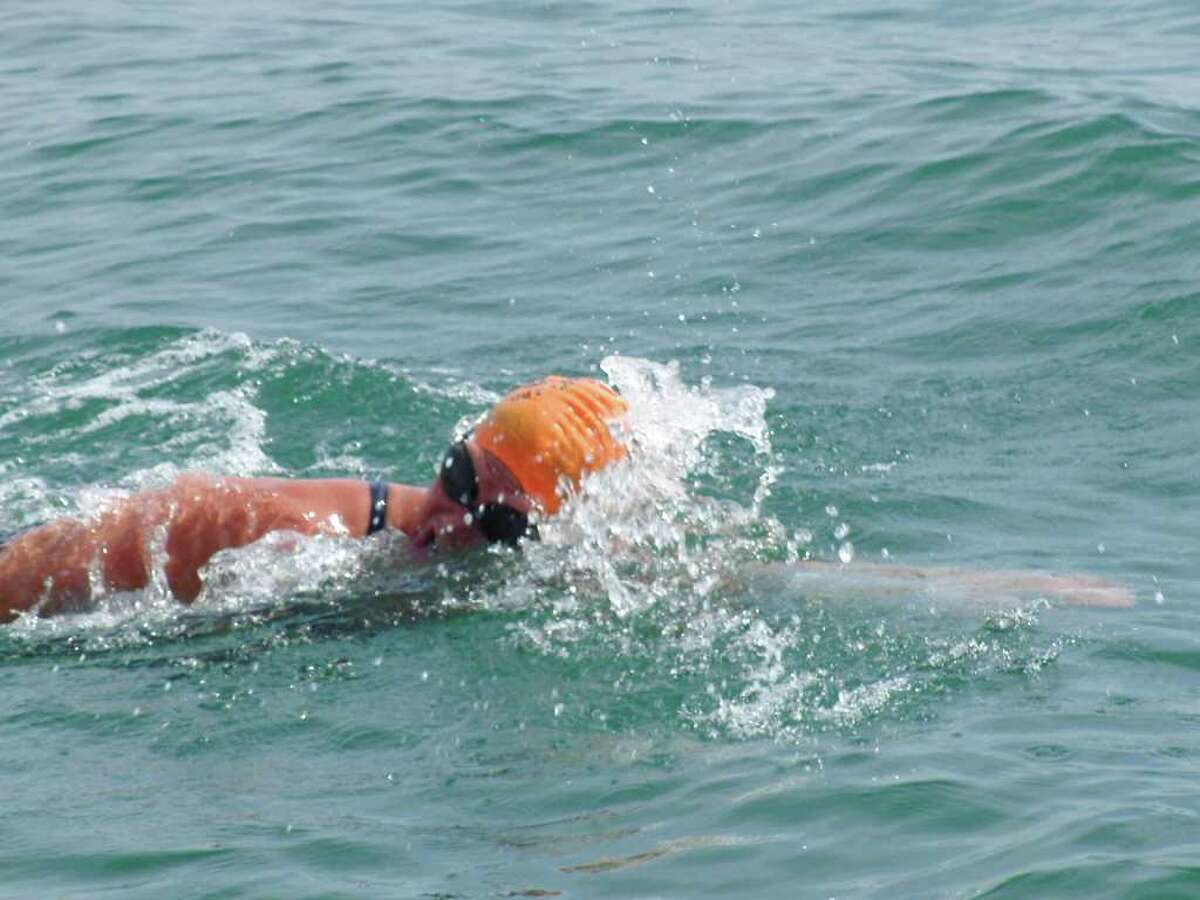 Westport's Liz Fry swims the 26-mile Lake Memphremagog race Sept. 11 from Newport, VT., to Magog, Quebec with a time of 13 hours and 25 minutes.