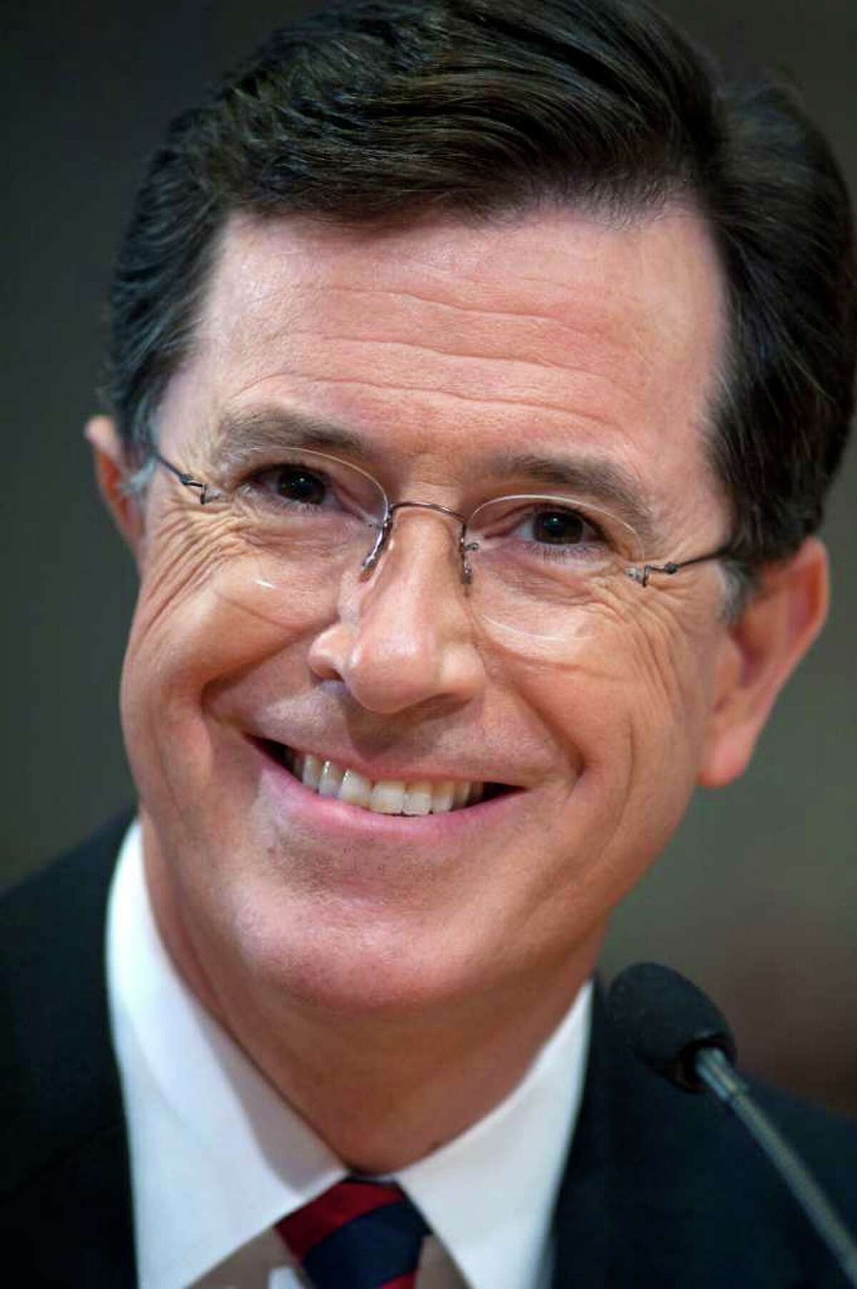 FILE- This Thursday, June 30, 2011 file photo shows comedian Stephen Colbert as he appears before the Federal Election Commission in Washington. Colbert says he will pay half a million dollars to help fund South Carolina's first-in-the-South GOP presidential primary. The Palmetto State native wrote in an op-ed Thursday in The State newspaper in Columbia that his super PAC will bridge the gap after state Republicans refused to contribute anything above candidates' filing fees. (AP Photo/Cliff Owen, File)
