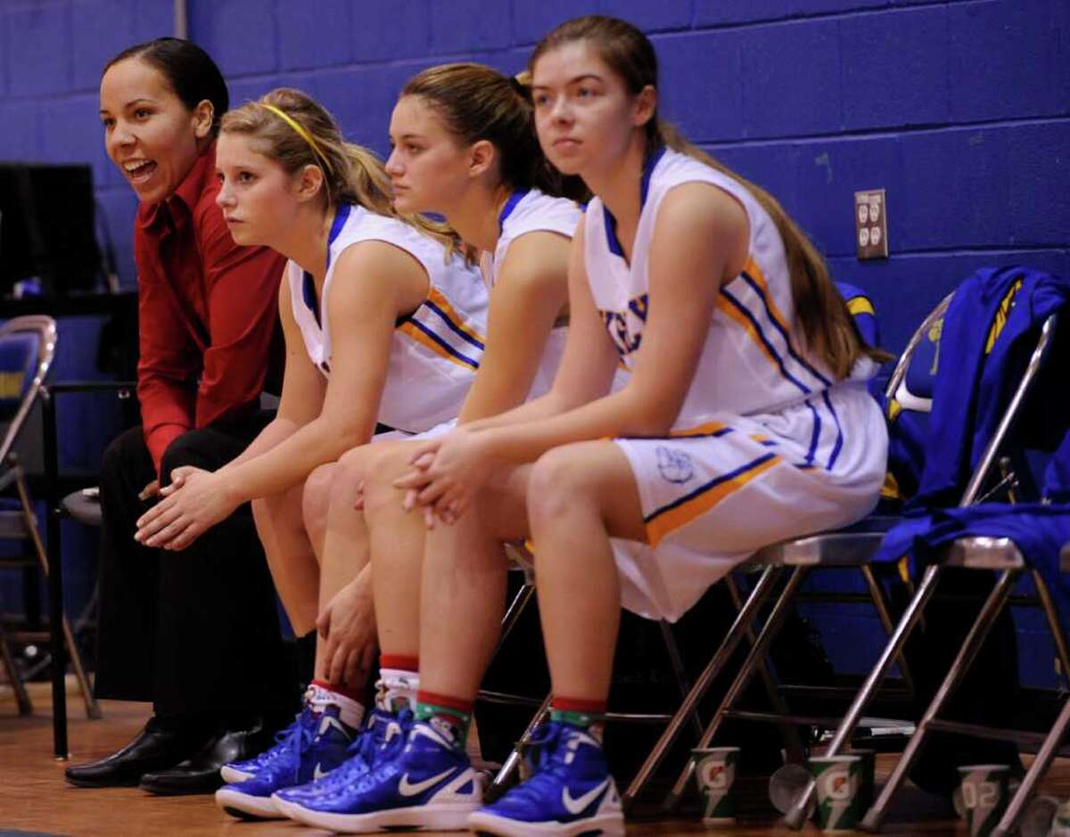 Father/daughter duo coaching basketball at Kelly