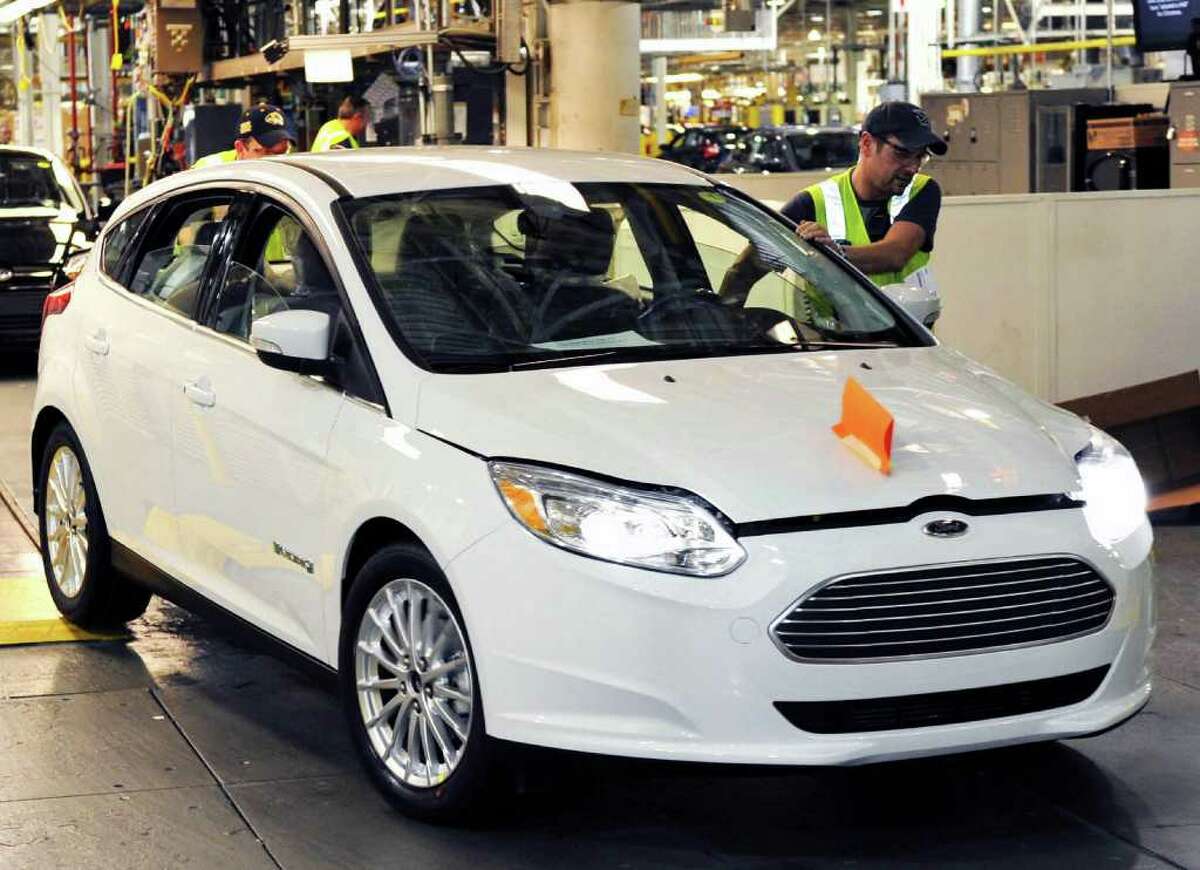 The new Focus battery-operated electric car comes off the line at Ford's Michigan Assembly Plant, which previously made large SUVs.