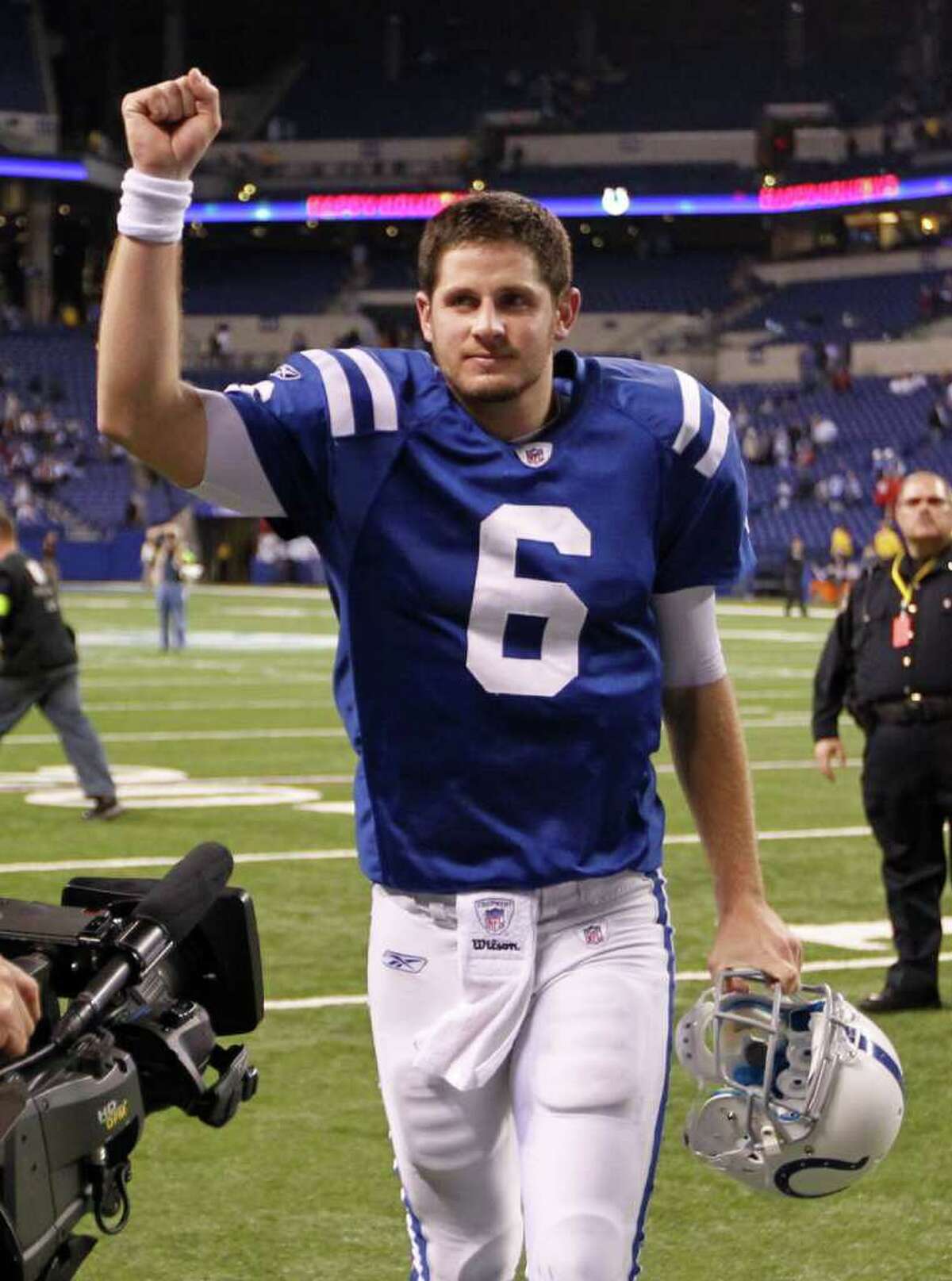 Indianapolis Colts quarterback Dan Orlovsky reacts as he runs off the field after the Colts defeated the Houston Texans 19-16 in an NFL football game, Thursday, Dec. 22, 2011, in Indianapolis.