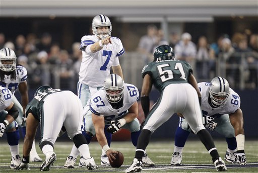 Dallas Cowboys quarterback Stephen McGee (7) is hit as he tries to throw by Houston  Texans defensive tackle Malcolm Sheppard (67) during the fourth quarter of  an NFL preseason football game Saturday