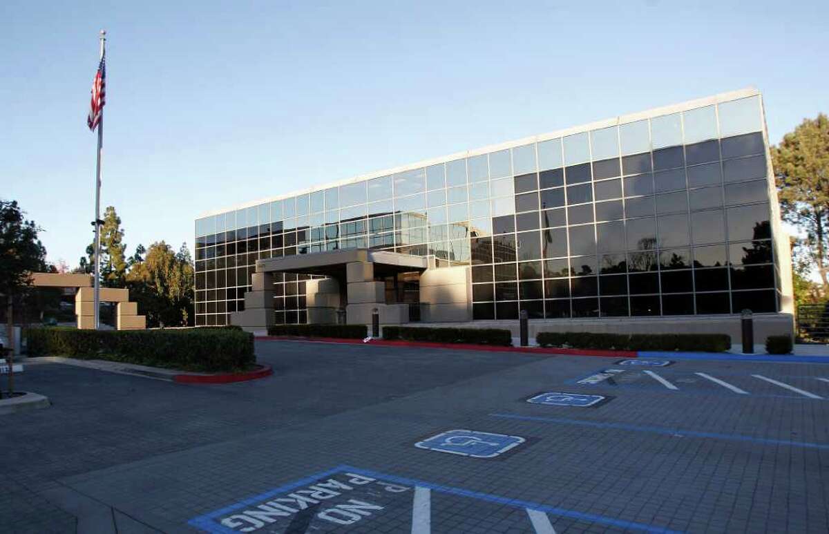 In this Dec. 22, 2011 photo, the sun slowly sets on the empty parking lot at the Zogenix headquarters in San Diego. The pharmaceutical maker is one of at least four companies working on purer, more powerful versions of the nation?’s second most-abused medicine, hydrocodone, a trend that has addiction experts worried that it could spur a new round of abuse. (AP Photo/Lenny Ignelzi)