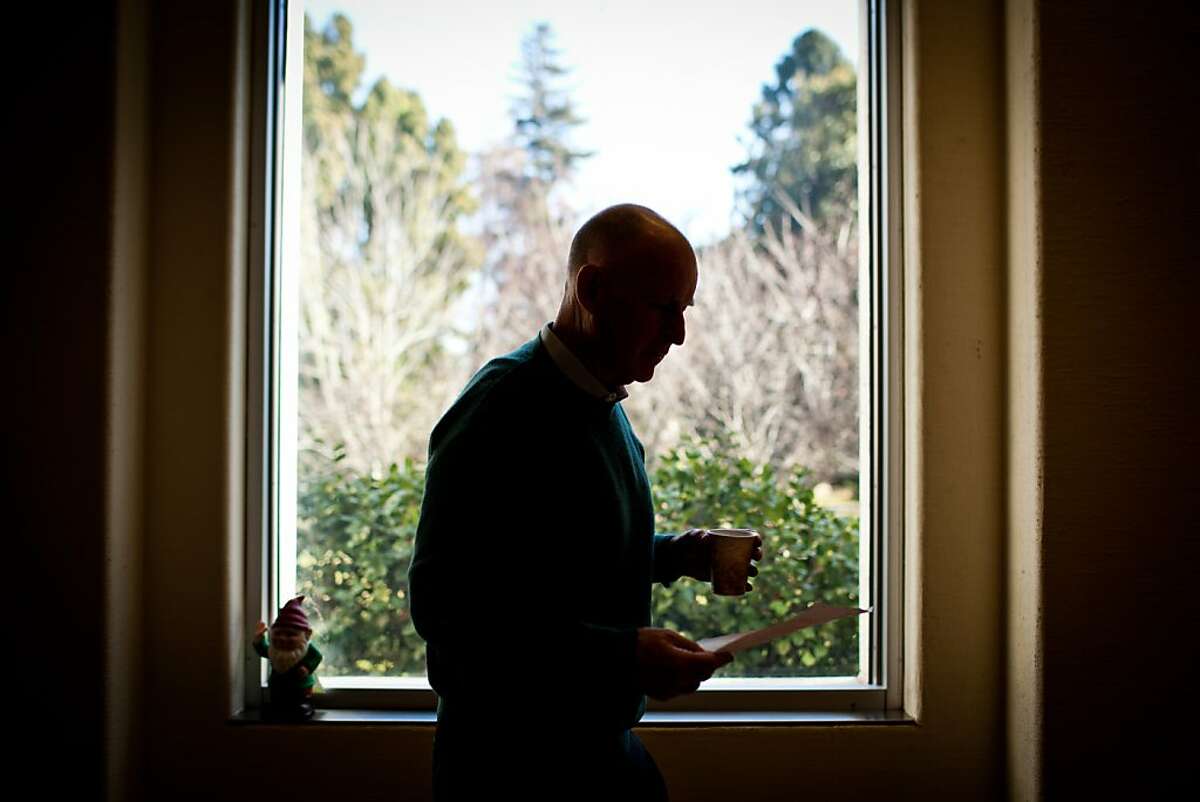 California Gov. Jerry Brown walks through his office in the State Capitol, Sacramento, Calif., December 27, 2011.