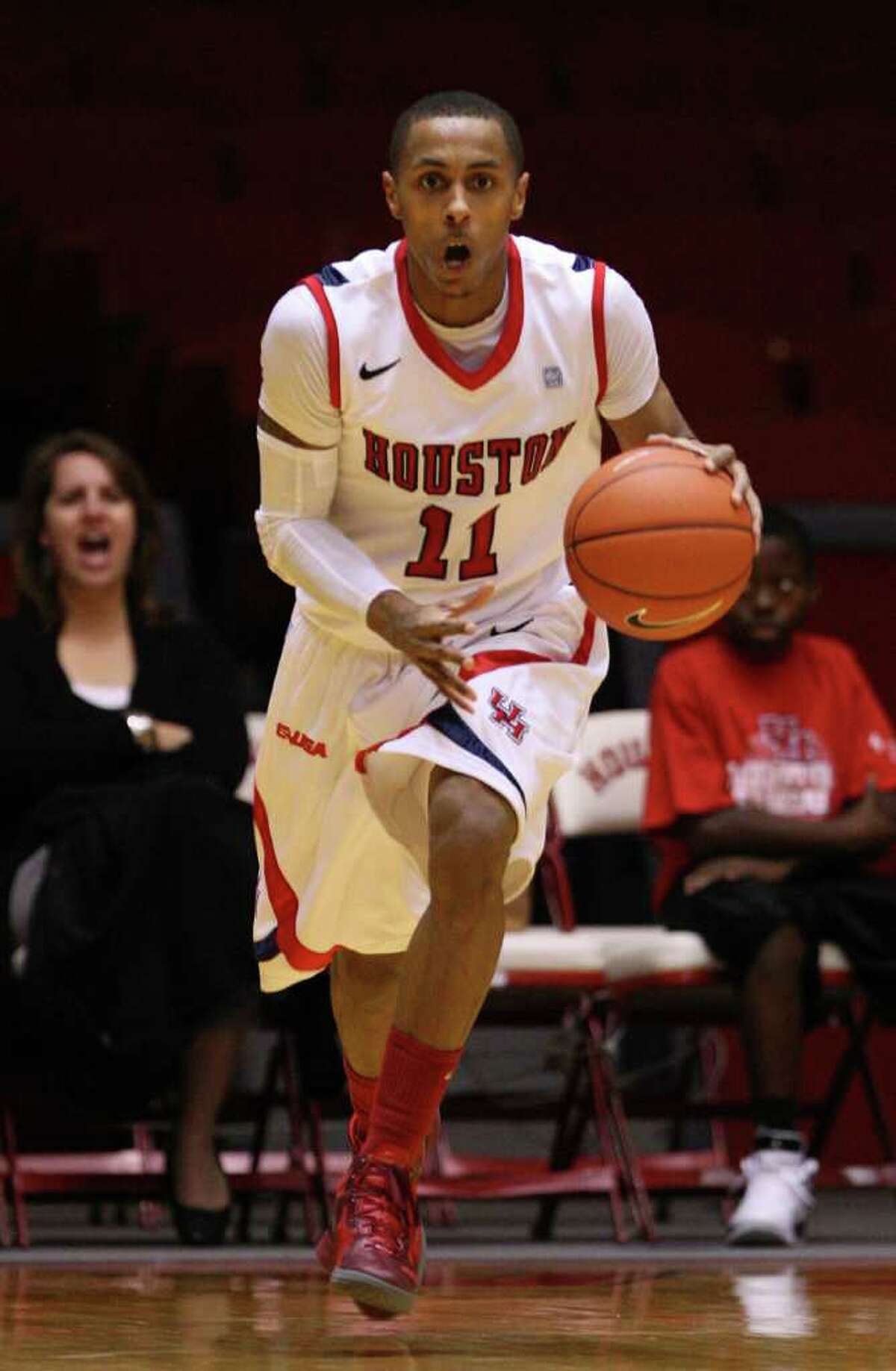 The University of Houston's Darian Thibodeaux drives the ball against North Carolina A&T during second half of men's college basketball game action at the University of Houston's Hofheinz Pavilion Wednesday, Dec. 28, 2011, in Houston.