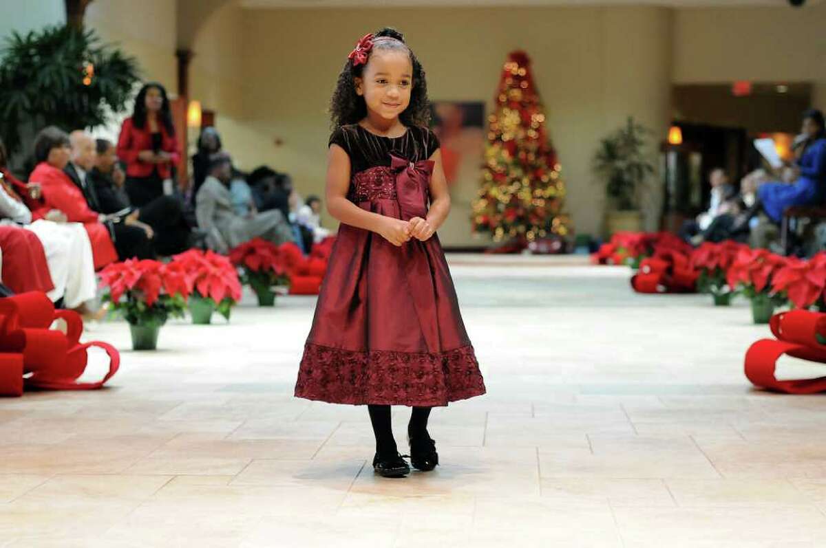 Kids model holiday fashions