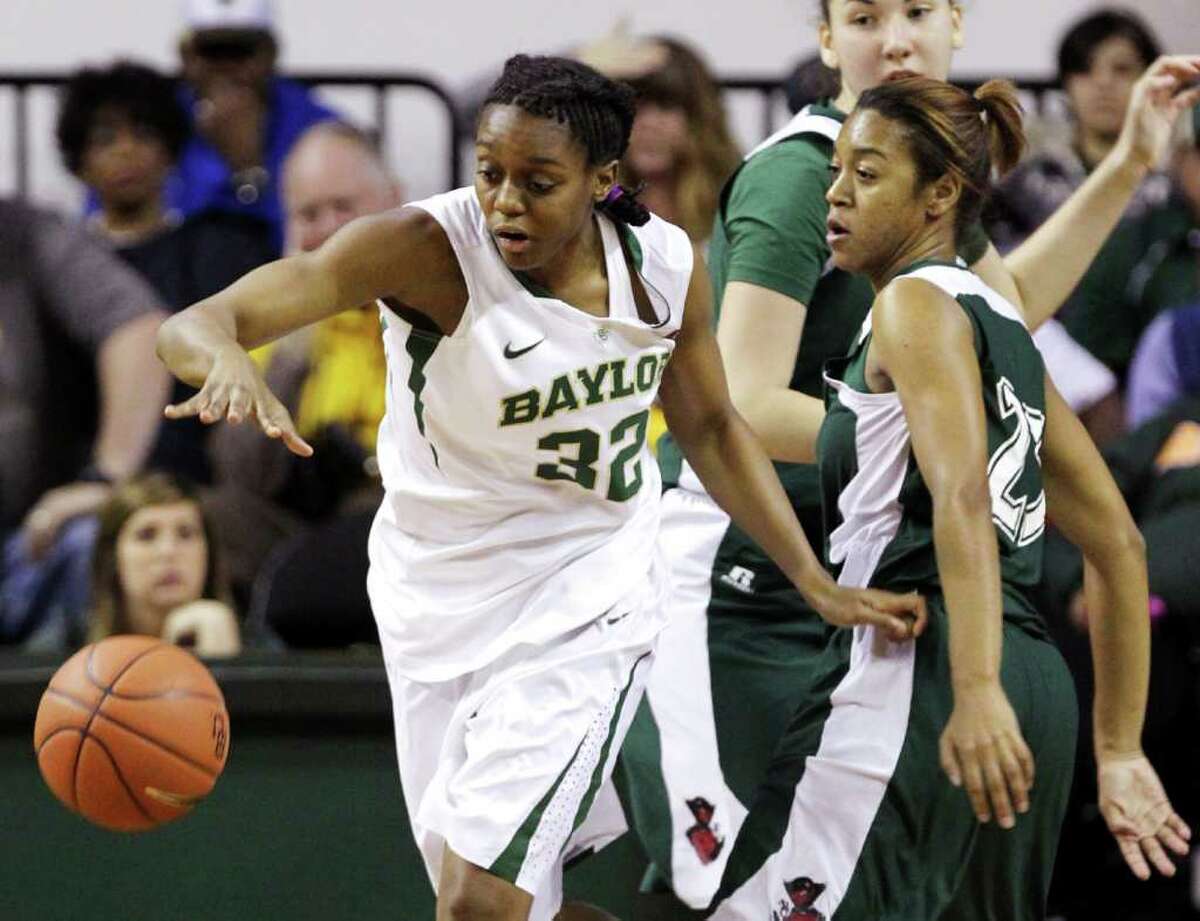 Baylor's Brooklyn Pope reaches for a loose ball in front of Mississippi Valley State's Aspen Clemons.