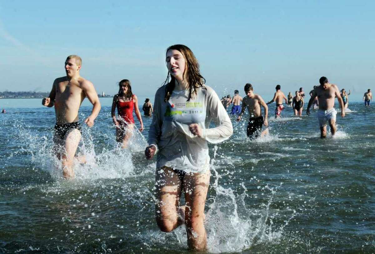 Kate Carlson, 14, at the 13th annual Polar Bear plunge in Long Island Sound at Greenwich Point Sunday, Jan. 1, 2012.