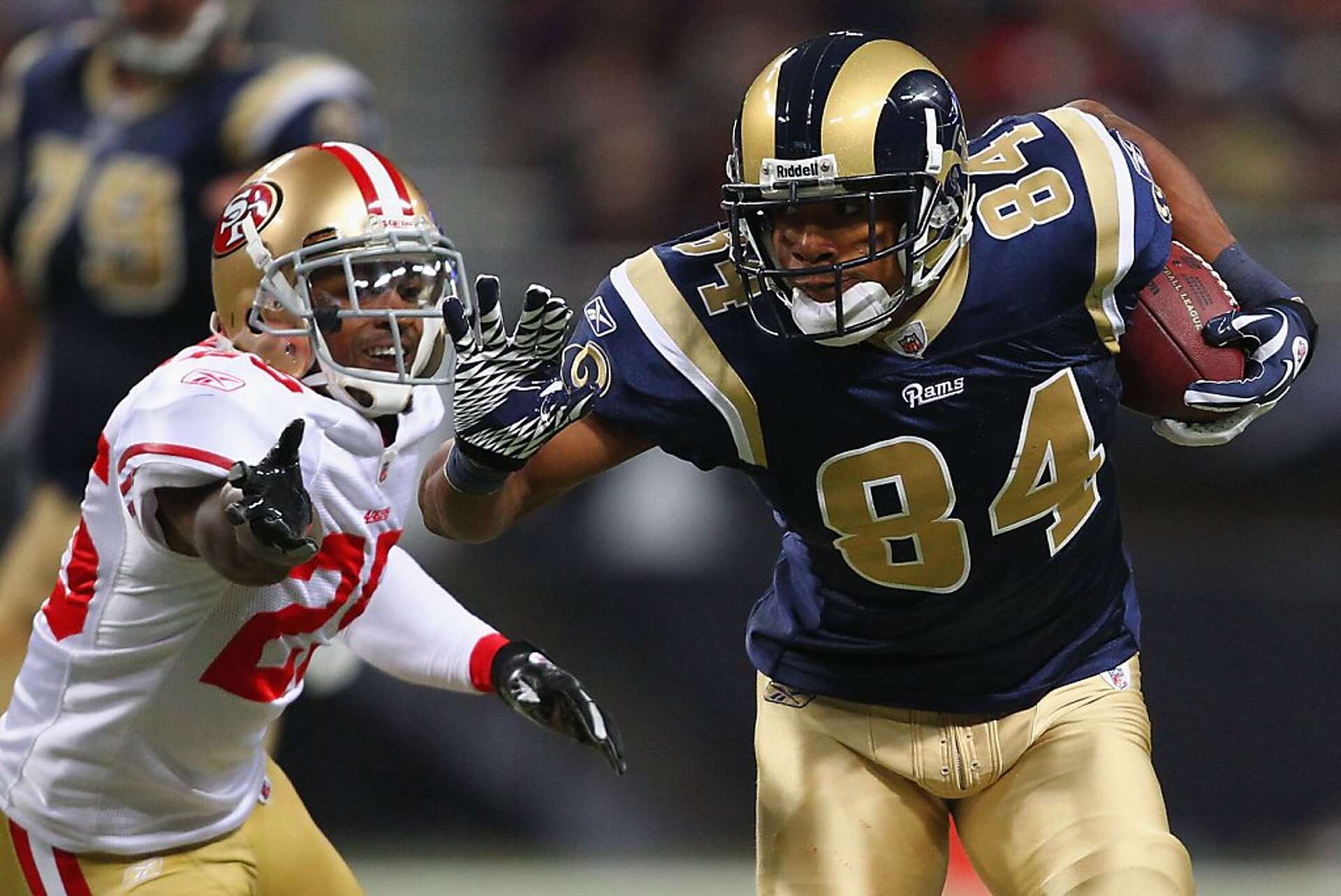 49ers earn playoff bye with 34-27 win over Rams