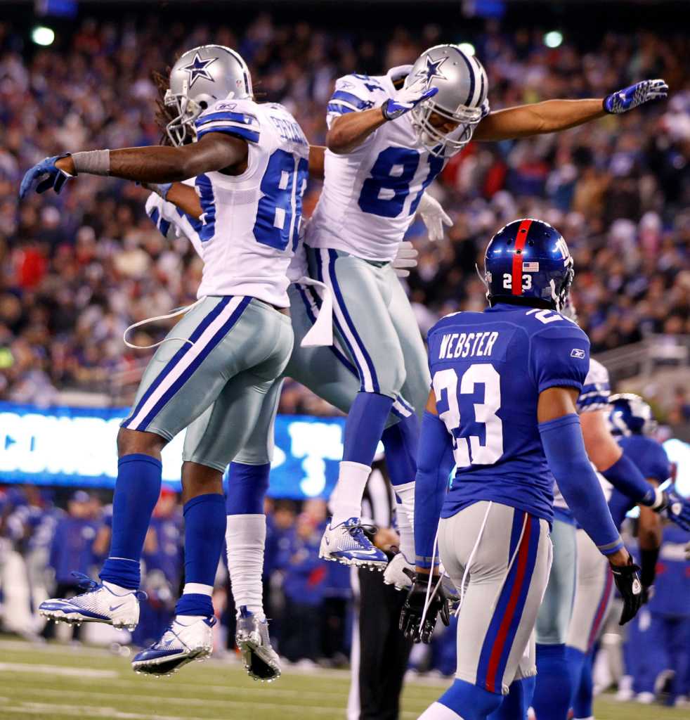 Dallas Cowboys wide receiver Laurent Robinson (81) is unable to bring in a  pass during an NFL football game against the Detroit Lions Sunday, Oct. 2,  2011, in Arlington, Texas. The Lions