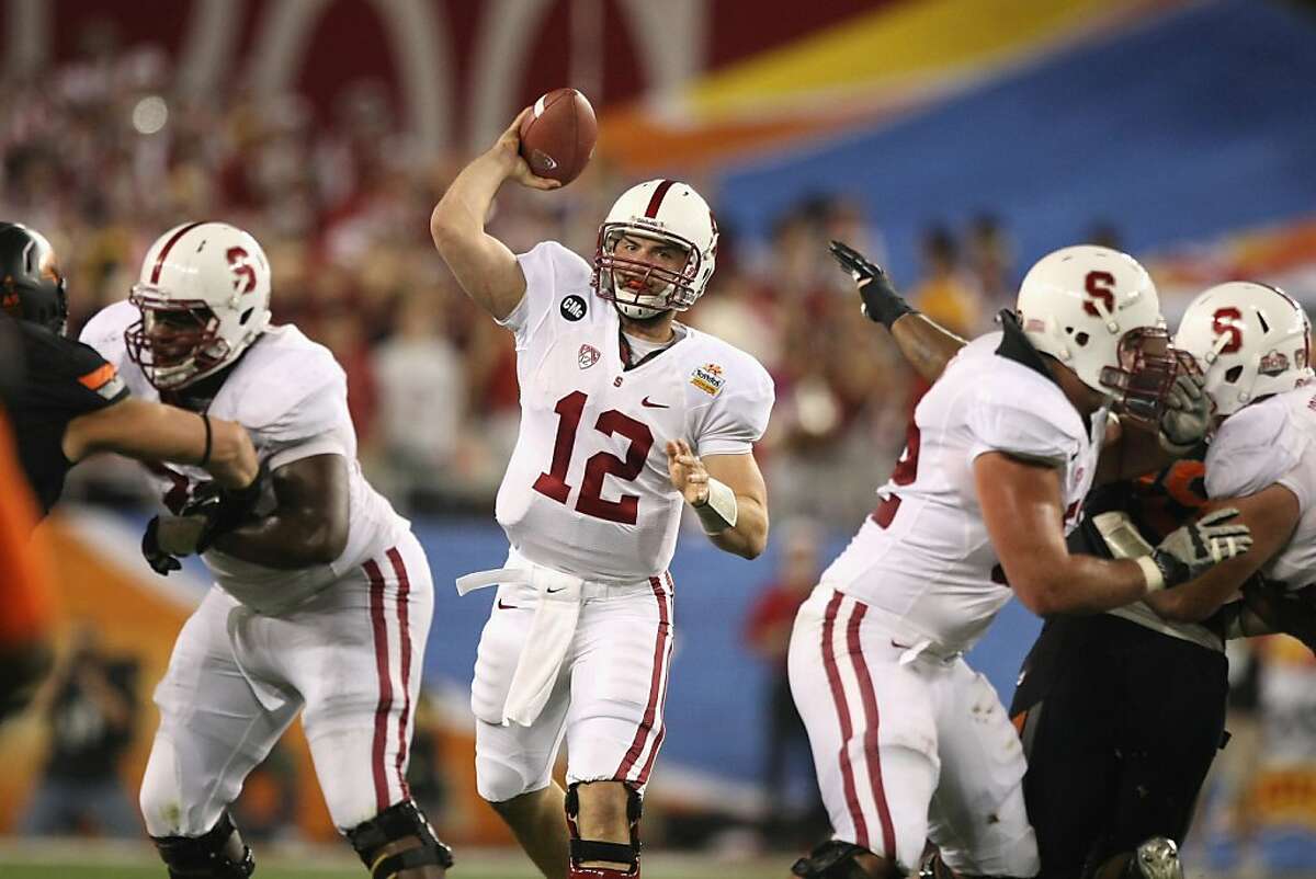 GLENDALE, AZ - JANUARY 02: Andrew Luck #12 of the Stanford Cardinal throws a pass against the Oklahoma State Cowboys during the Tostitos Fiesta Bowl on January 2, 2012 at University of Phoenix Stadium in Glendale, Arizona. (Photo by Donald Miralle/Getty Images)