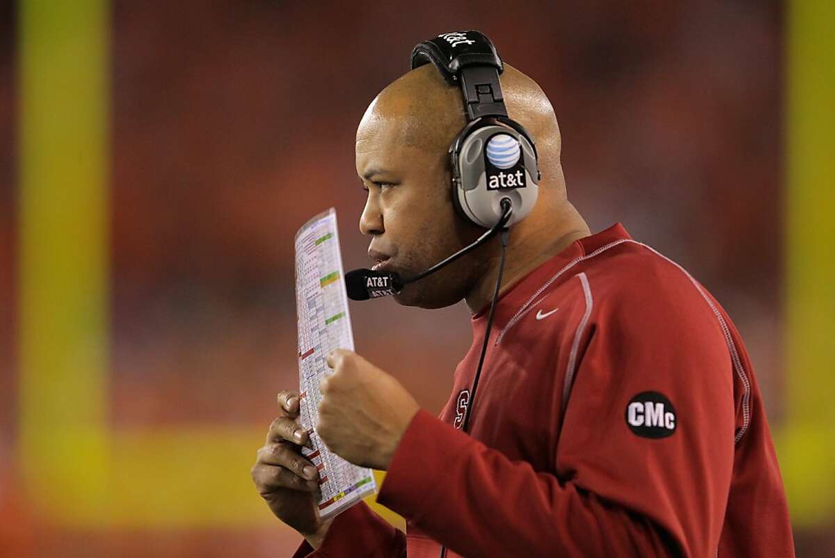 GLENDALE, AZ - JANUARY 02: Head coach David Shaw of the Stanford Cardinal coaches against the Oklahoma State Cowboys during the Tostitos Fiesta Bowl on January 2, 2012 at University of Phoenix Stadium in Glendale, Arizona. (Photo by Doug Pensinger/Getty Images)