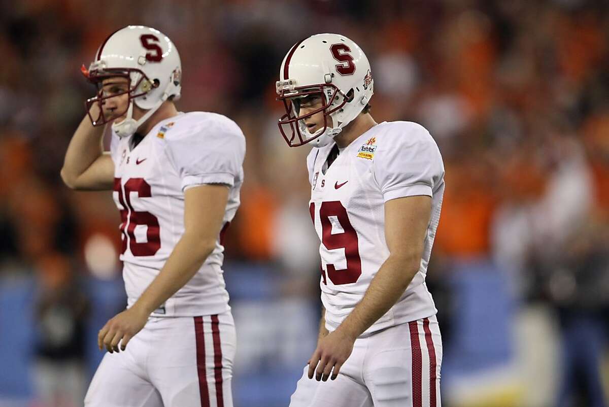 GLENDALE, AZ - JANUARY 02: Jordan Williamson #19 of the Stanford Cardinal walks off of the field after he missed a field goal attempt in overtime against the Oklahoma State Cowboys during the Tostitos Fiesta Bowl on January 2, 2012 at University of Phoenix Stadium in Glendale, Arizona. (Photo by Doug Pensinger/Getty Images)