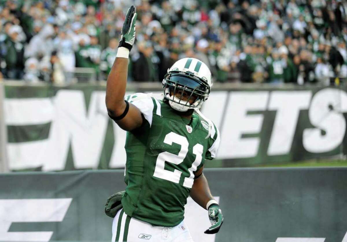 FILE - In this Dec. 11, 2011, file photo, New York Jets' LaDainian Tomlinson gestures to the fans before the NFL football game between the Kansas City Chiefs and the Jets in East Rutherford, N.J. Jets running back LaDainian Tomlinson says their game scheduled for Sunday, Jan. 1 at Miami could possibly be the last of his career if New York does not make the playoffs. Tomlinson, set to become a free agent, says Thursday, Dec. 29 that he will "wait and see" before deciding on whether to continue playing beyond this season, adding that he'll retire if the situation isn't right. (AP Photo/Bill Kostroun, File)