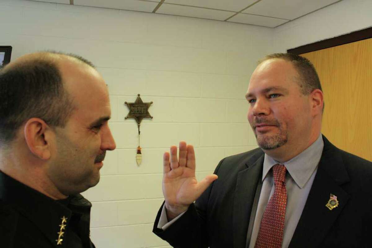 David Dean, at right, is sworn in. After an intense and aggressive region-wide search, the Schenectady County SPCA is pleased to announce that Dean was appointed as the organization's new chief humane law enforcement officer. Dean was sworn in by Sheriff Dominic Dagostino Tuesday afternoon. With a longstanding and proven track record in the field of law enforcement, Dean will lead a reliant and focused team of SPCA officers who are now called upon by Schenectady County to handle many animal related issues. (Photo provided)
