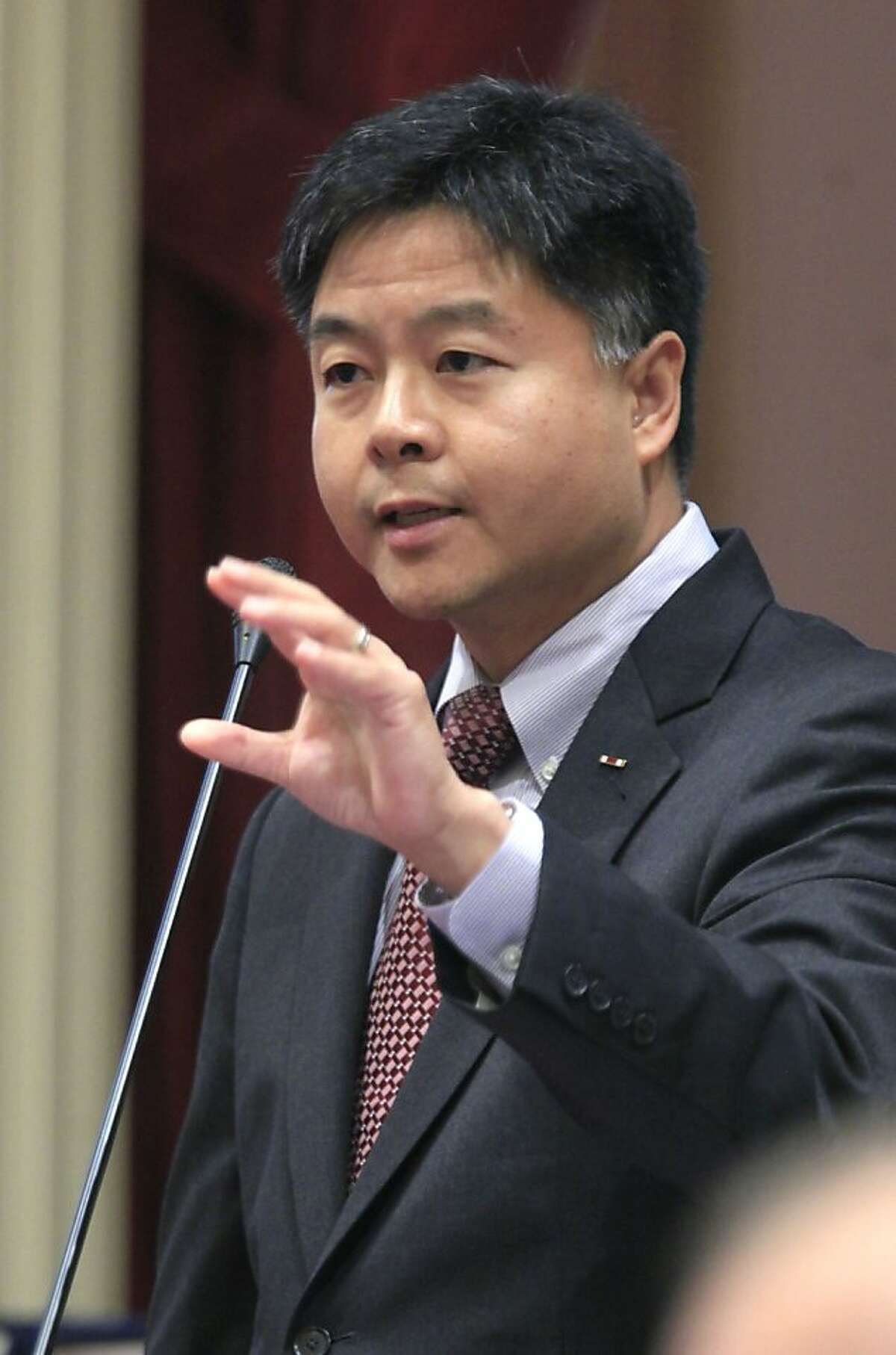 FILE- This file photo taken Sept. 9, 2011, shows California State Sen. Ted Lieu , D-Torrance , as he speaks before the Senate at the Capitol in Sacramento, Calif. Lieu is considering calling for a boycott of Lowe's stores after the home improvement chain pulled its advertising from a reality show about Muslim-Americans. Calling the retail giant's decision "naked religious bigotry," Lieu said Sunday, Dec. 11, 2011, he would also consider legislative action if Lowe's doesn't apologize to Muslims and reinstate its ads. (AP Photo/Rich Pedroncelli, File)