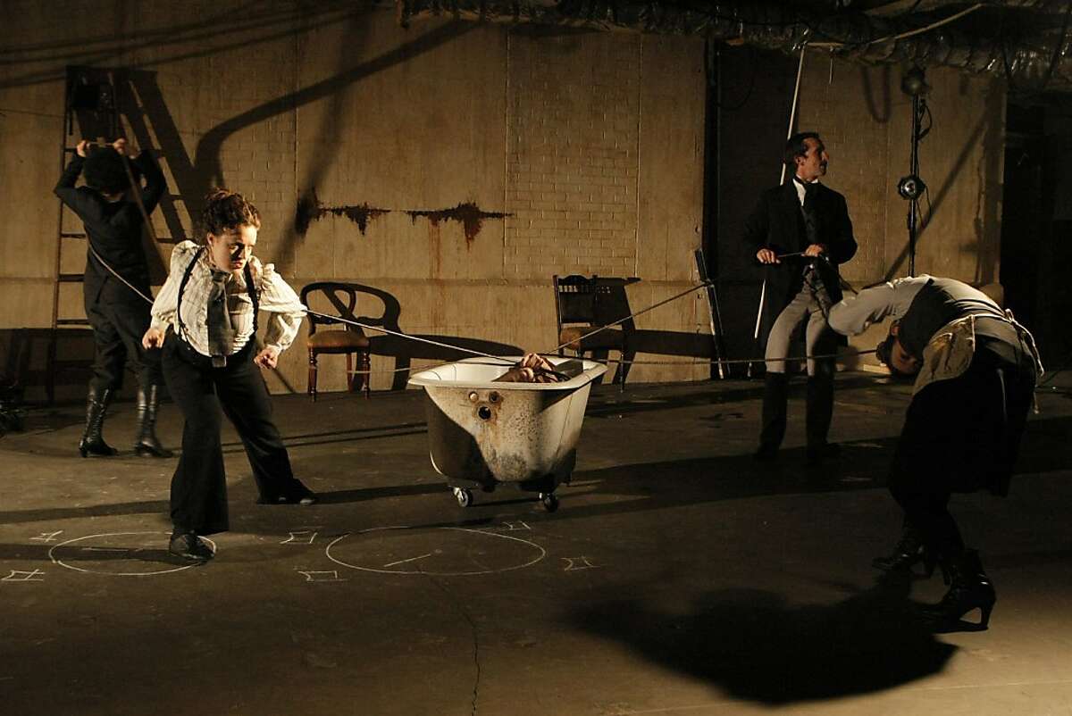The cast of Mugwumpin's "Future Motive Power" during a rehearsal in the Old Mint Building in San Francisco, Calif., on Wednesday, December 21, 2011. From left, Rami Margron, Natalie Greene, Joseph Estlack (in tub), Christopher W. White, and Misti Boetigger perform. The play is inspired by the peculiar life of Nikola Tesla.