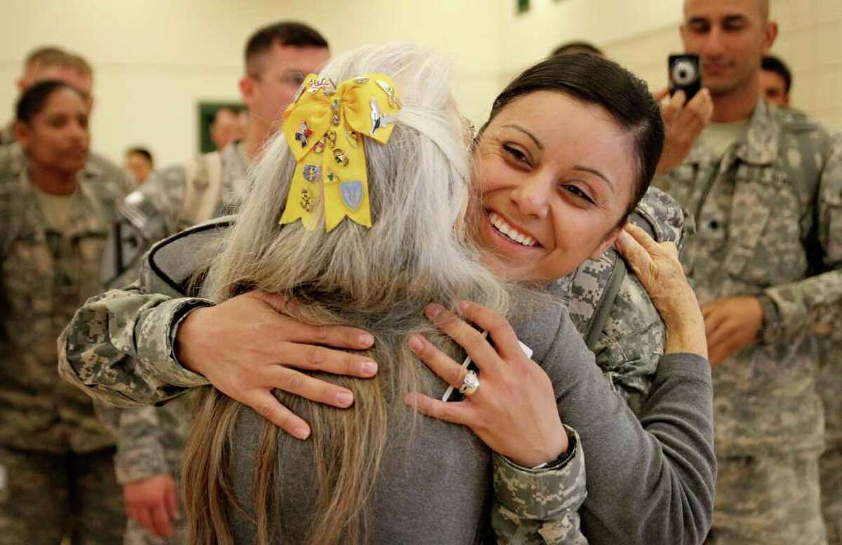  Elizabeth Laird said it's God and patriotism that give her the energy to see off airplane after airplane full of soldiers at Robert Gray Army Airfield and welcome them home again with hugs.