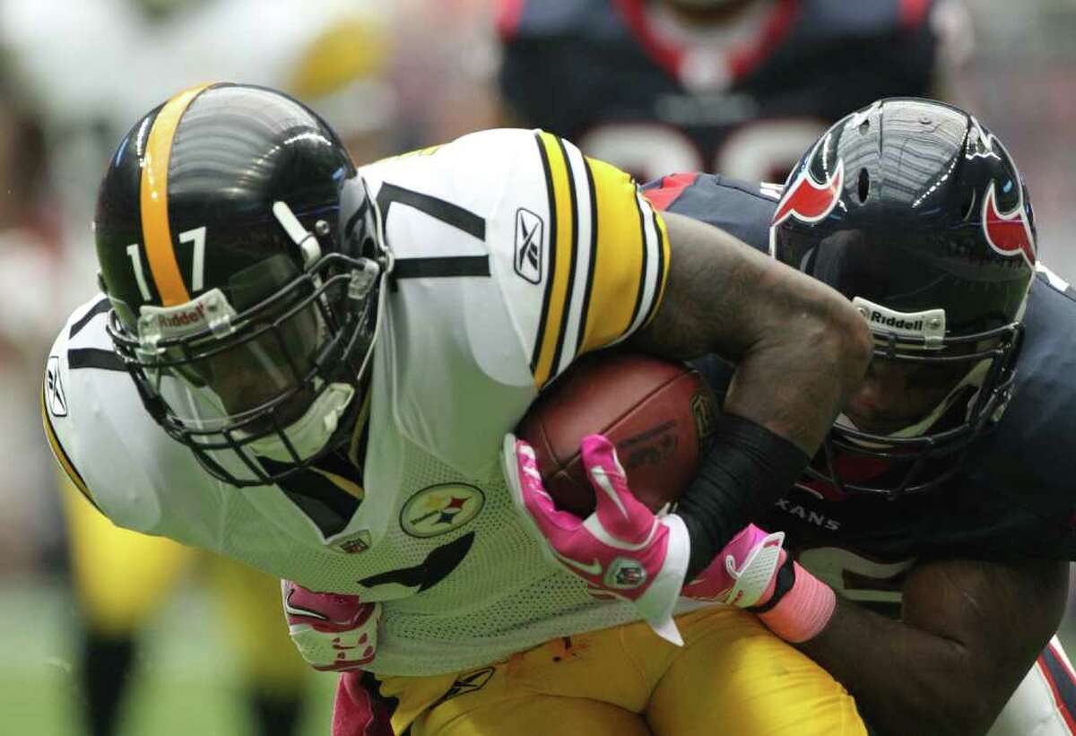 Receiver Mike Wallace and the Steelers were brought down by safety Danieal Manning and the Texans on Oct. 2 at Reliant Stadium.