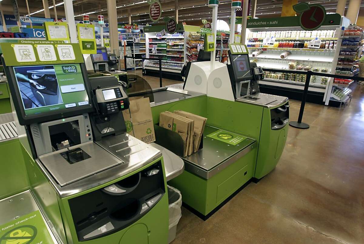 Checkout lanes are ready to go at the new Fresh & Easy grocery store in San Francisco, Calif. on Tuesday, June 21, 2011. The new market, opening Wednesday, features self-serve checkout aisles but will also has staff standing by to assist shoppers.
