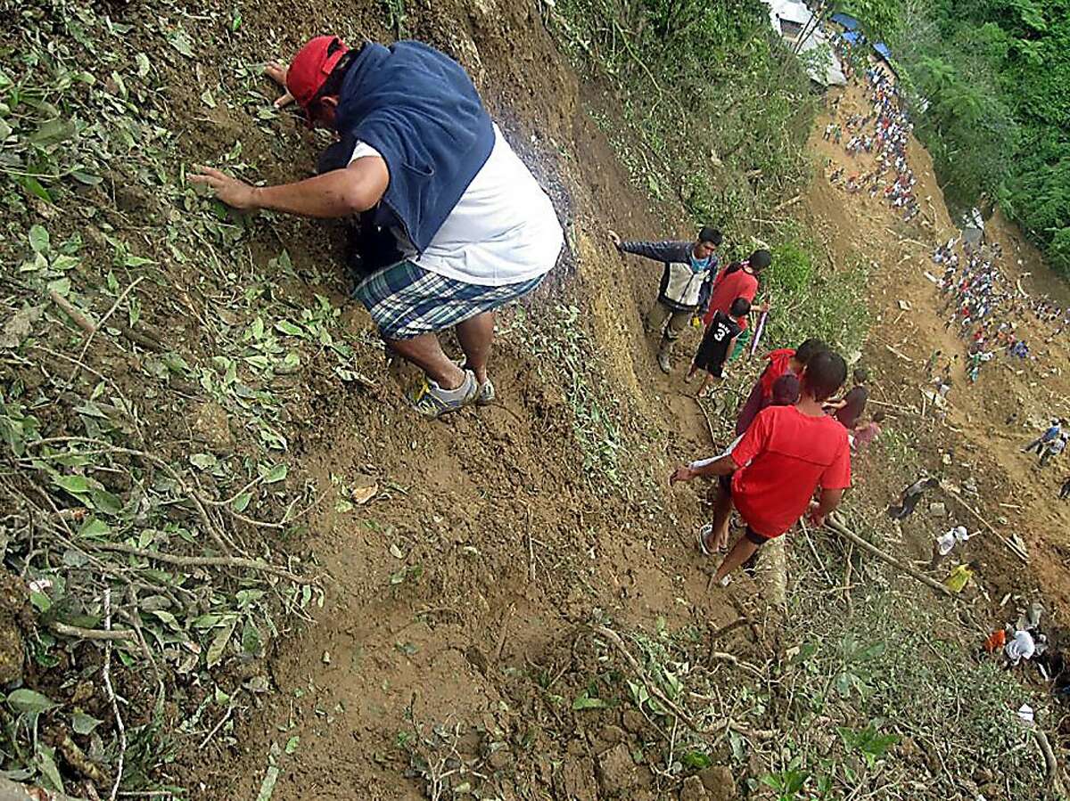 Landslide in Philippines buries dozens near Manila
