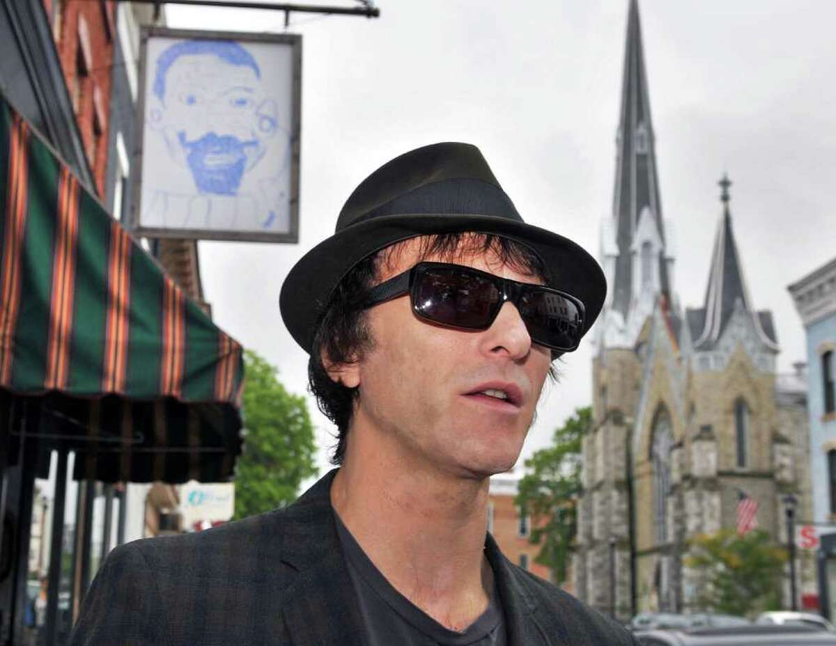 Tommy Stinson, a new resident of Hudson and former bassist in The Replacements, takes a stroll along Warren Street in Hudson this past September (Friday Sept. 23, 2011) before hitting the road on his latest assignment. Stinson is now playing with Guns n Roses on its worldwide tour. (John Carl D'Annibale / Times Union)