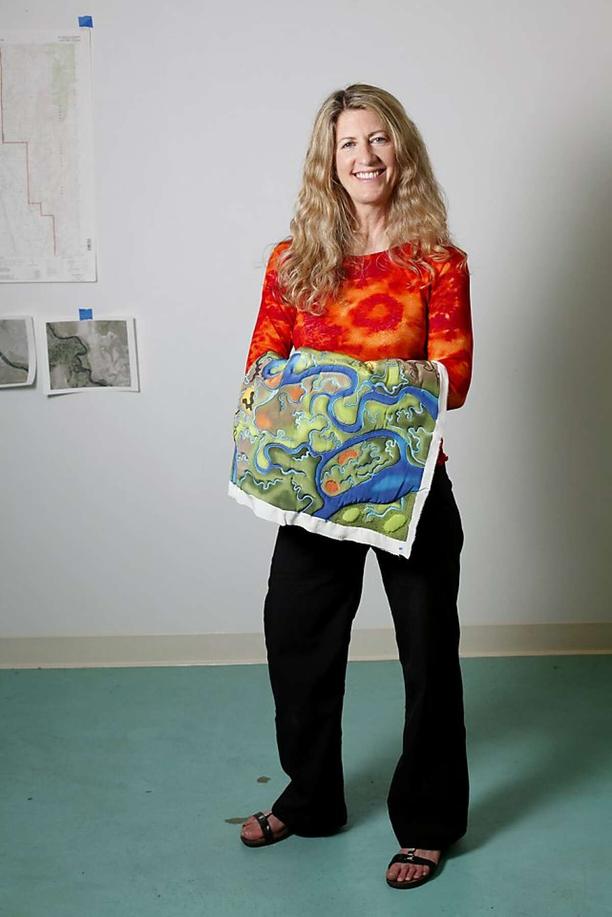 Linda Gass is an artist who creates stitched paintings on silk. She is photographed in her studio in Palo Alto, Calif., Tuesday, November 1, 2011. (**note - that is how she refers to her work, not as quilts**)(to be cut out)