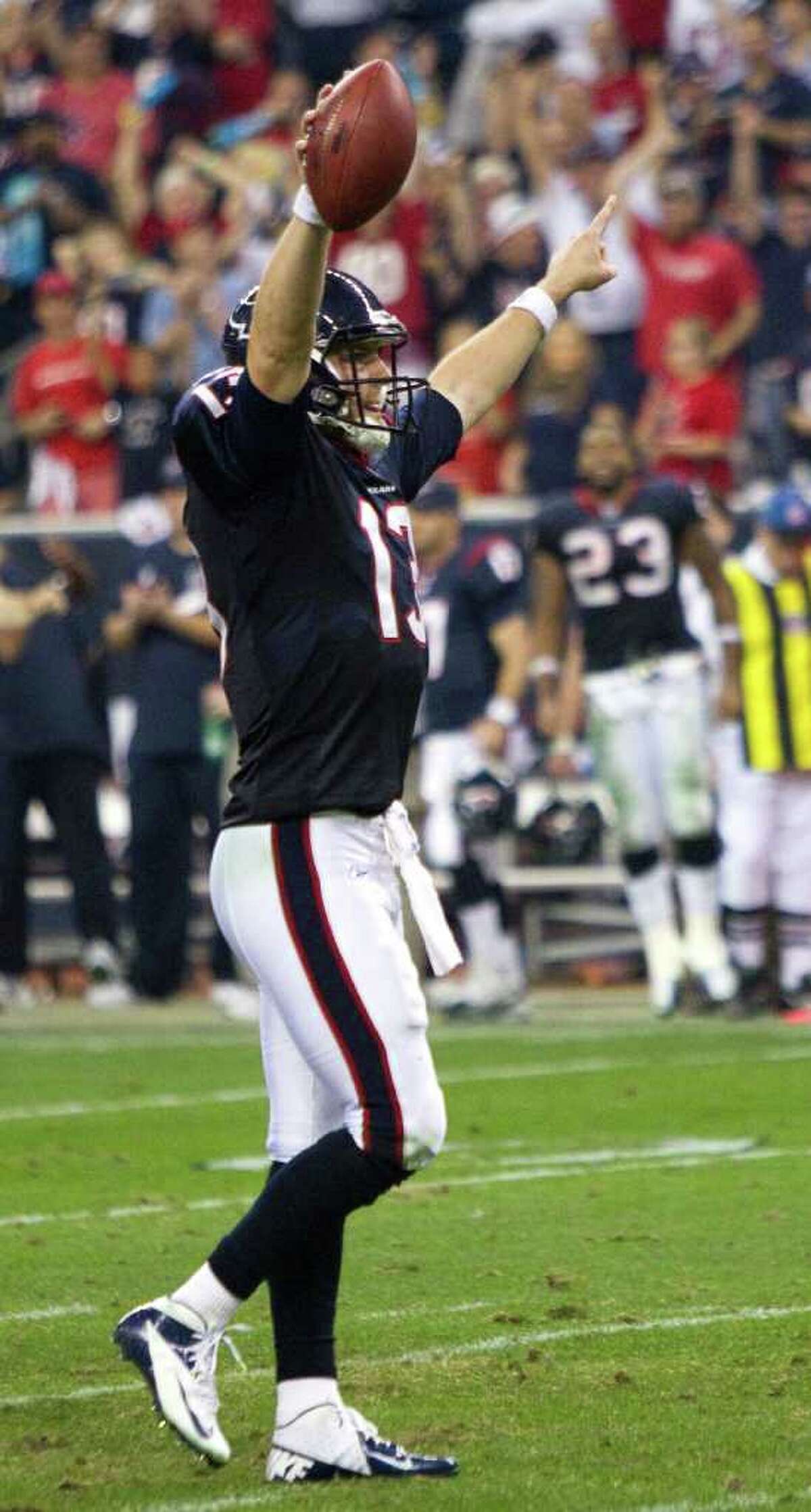 Texans rookie QB T.J. Yates celebrates the win. Yates connected on 11 of his 20 attempts for 159 yards. None of his passes found a Bengal.