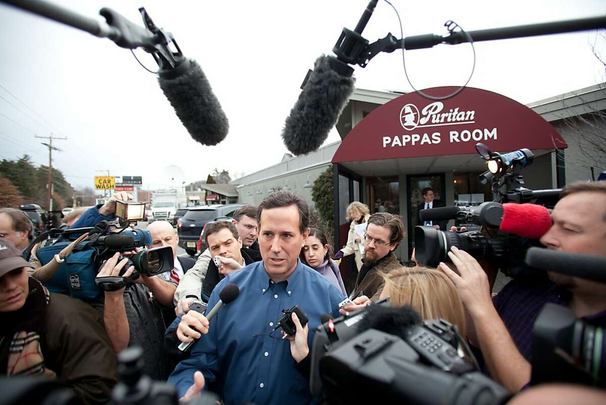 MANCHESTER, NH - JANUARY 05: Republican Presidential candidate, former U.S. Sen. Rick Santorum speaks to members of the media following his appearance at a Rotary Club breakfast in Manchester New Hampshire on January 05, 2012 in Manchester, New Hampshire. Santorum continued his campaign in New Hampshire for the upcoming primary election after he finished second in the Iowa Caucus, losing to Mitt Romney by only eight votes. (Photo by Matthew Cavanaugh/Getty Images)