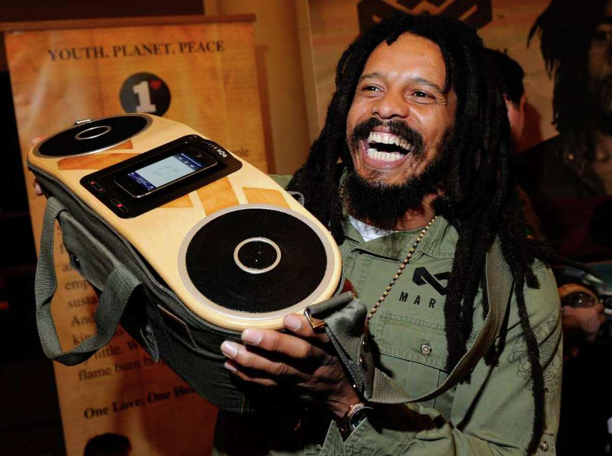 LAS VEGAS, NV - JANUARY 08: Rohan Marley, son of late Reggae musician Bob Marley, displays the USD 249 Bag of Rhythm audio player with docking station for iPhones and iPods from House of Marley during a press event at The Venetian for the 2012 International Consumer Electronics Show (CES) January 8, 2012 in Las Vegas, Nevada. CES, the world's largest annual consumer technology trade show, runs from January 10-13 and is expected to feature 2,700 exhibitors showing off their latest products and services to about 140,000 attendees. (Photo by Ethan Miller/Getty Images)