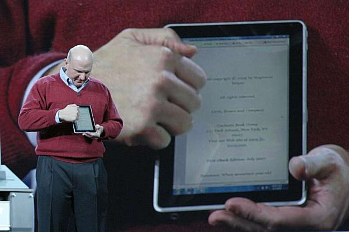 ** ADVANCE FOR USE TUESDAY, JAN. 12 AND THEREAFTER ** FILE - In this Jan. 6, 2010 file photo, Microsoft CEO Steve Ballmer delivers his keynote address at the 2010 Consumer Electronics Show where he showcased the new touch-enabled slate from HP. Ballmer showed off the new touch-screen, tablet-style computer from Hewlett-Packard Co., the first of several such devices expected to be unveiled this month. Speculation is growing that in two weeks Apple will unveil a tablet-style touch-screen computer that is bigger than an iPhone but smaller than a standard laptop.
