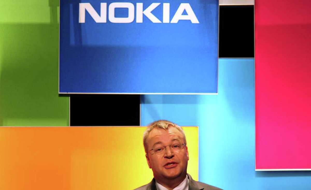 CEO Stephen Elop and Nokia Corp. are hoping for a turnaround through the use of Microsoft's new phone software. Apple and Google dominate in smartphones.
