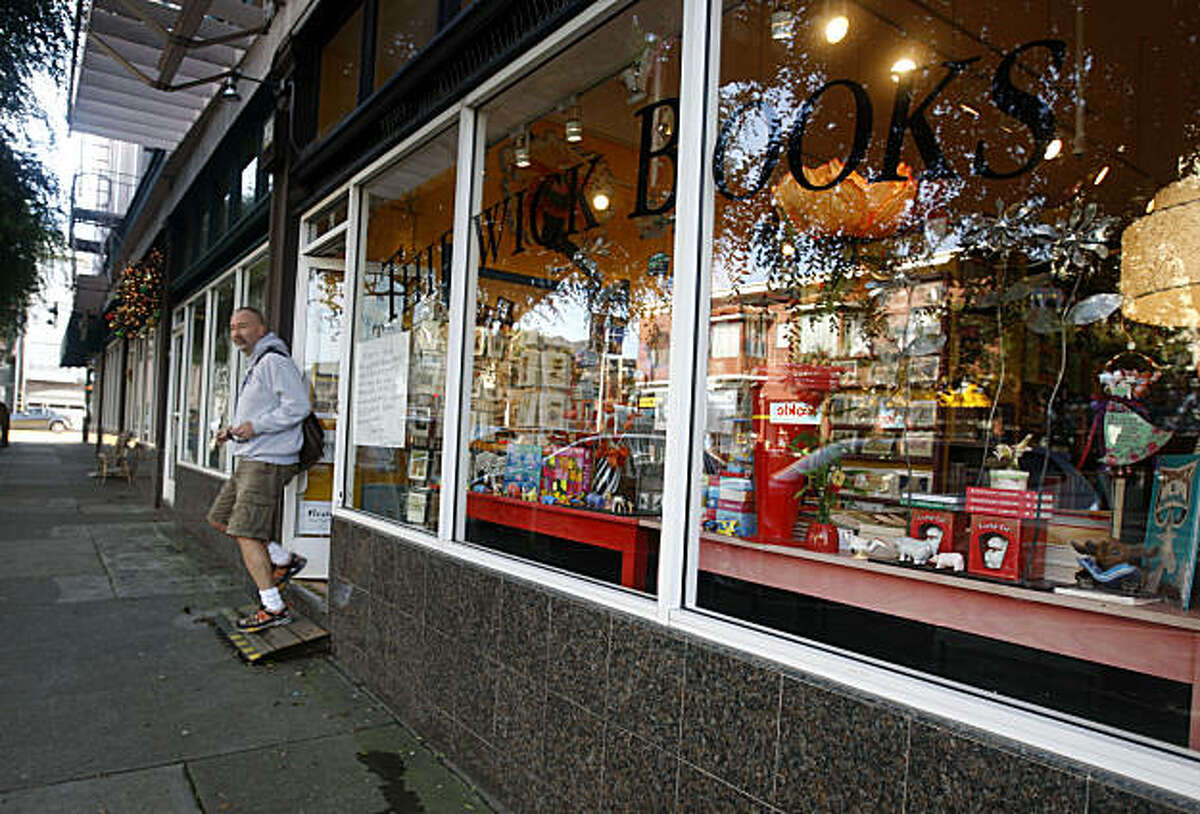 A customer leaves after shopping at Thidwick Books on Clement Street in San Francisco, Calif., on Thursday, Dec. 23, 2010. Store owner Leagrey Dimond is being forced to close her bookstore after 11 years and relocate after lawsuits were filed to force her to comply with costly ADA requirements.