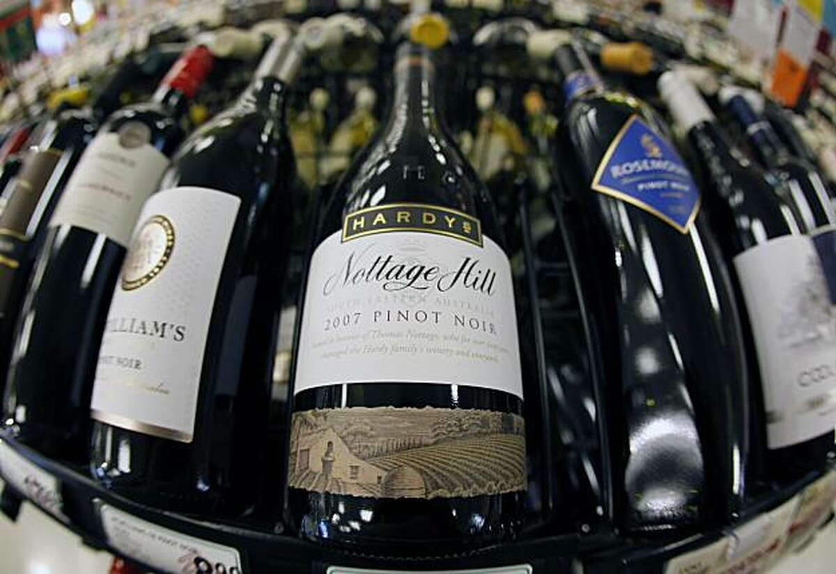 A bottle of Hardys Nottage Hill wine, center, produced by Constellation Brands, Inc., is shown at Premier Wine & Spirits in Williamsville, N.Y., Thursday, Dec. 23, 2010. Constellation Brands Inc. said Thursday it is selling an 80 percent stake in its Australian and British wine business to an Australian private equity firm for about $230 million, losing its distinction as the world's biggest wine company.