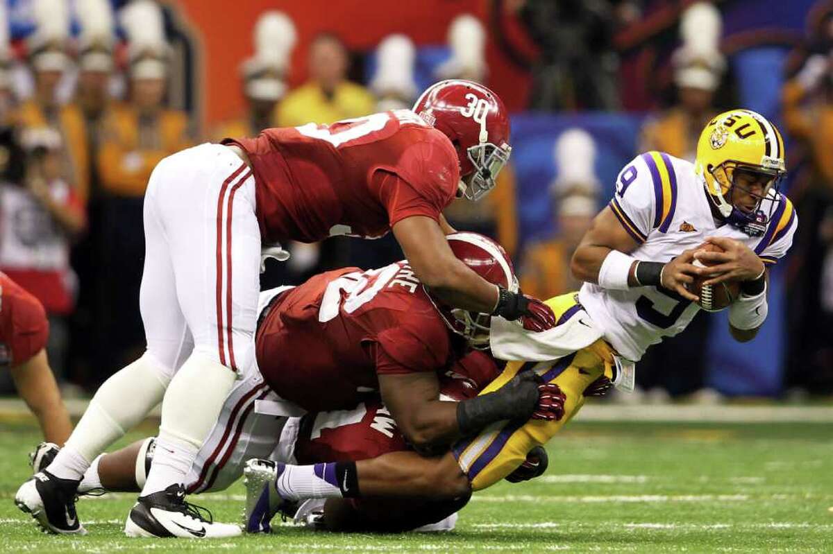 A nightmarish game for LSU quarterback Jordan Jefferson included this second-quarter sack courtesy of a trio of Alabama defenders. LSU was held to 92 total yards and five first downs Monday night.