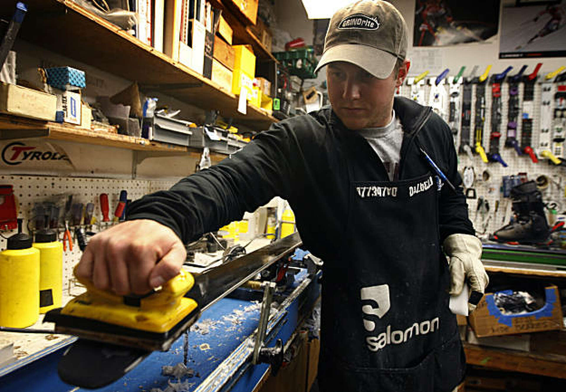 Bobby Panighetti adds a fresh layer of wax to a pair of skis at California Ski Company in Berkeley, Calif., on Thursday, Dec. 16, 2010. A recent study shows that perflourochemicals in ski wax carry potentially serious health risks.