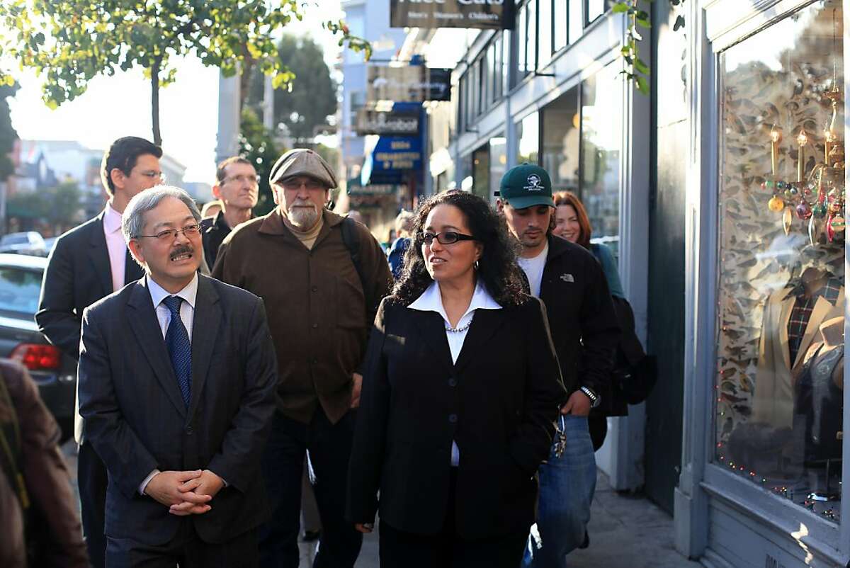 Mayor Ed Lee (left) and newly appointed District 5 Supervisor Christina Olague walk on Haight Street during a merchant walk last January.