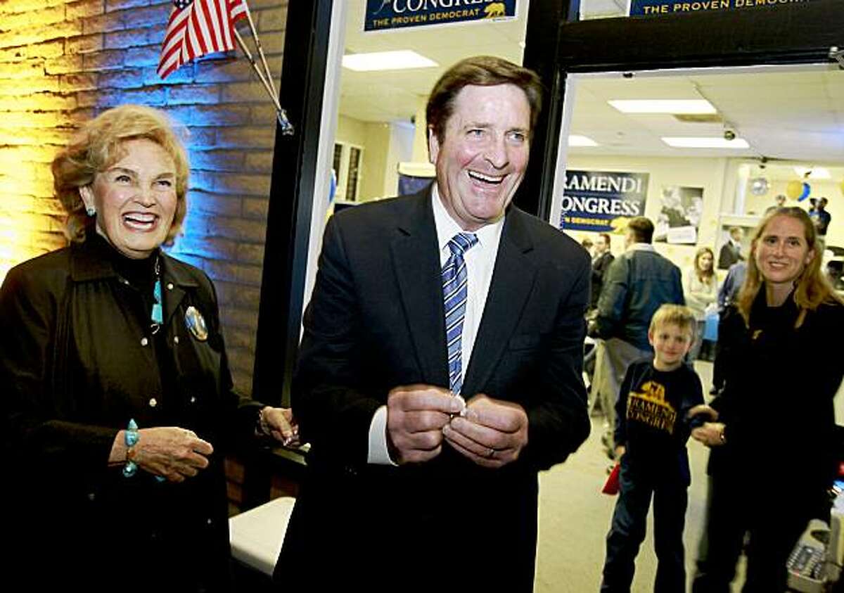 John Garamendi and his wife Patti laugh as they open a fortune cookie and found good news. Lt. Gov John Garamendi arrived at his Walnut Creek headquarters Tuesday night waiting for the results from the 10th Congressional district race.