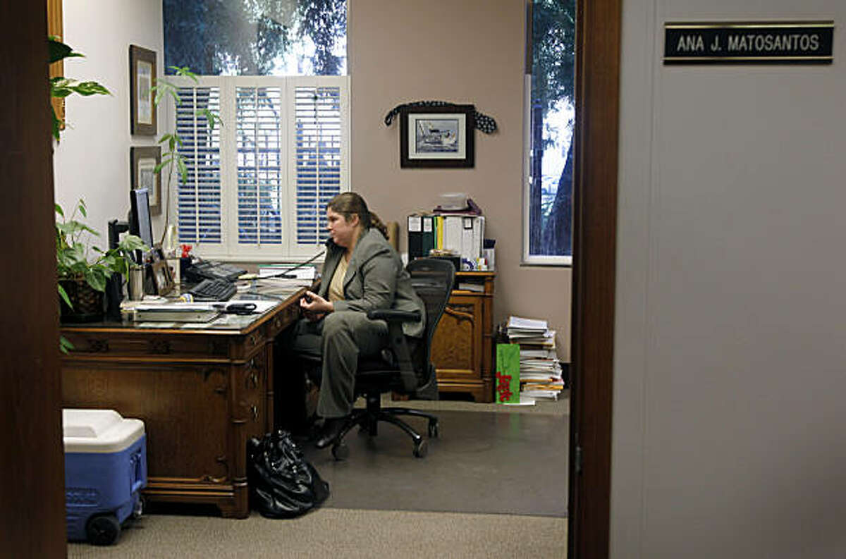 Ana Matosantos, the director of the California Department of Finance, takes a call from Governor Jerry Brown in her office at the State Capitol in Sacramento, Calif., on Wednesday, Feb. 16, 2011.