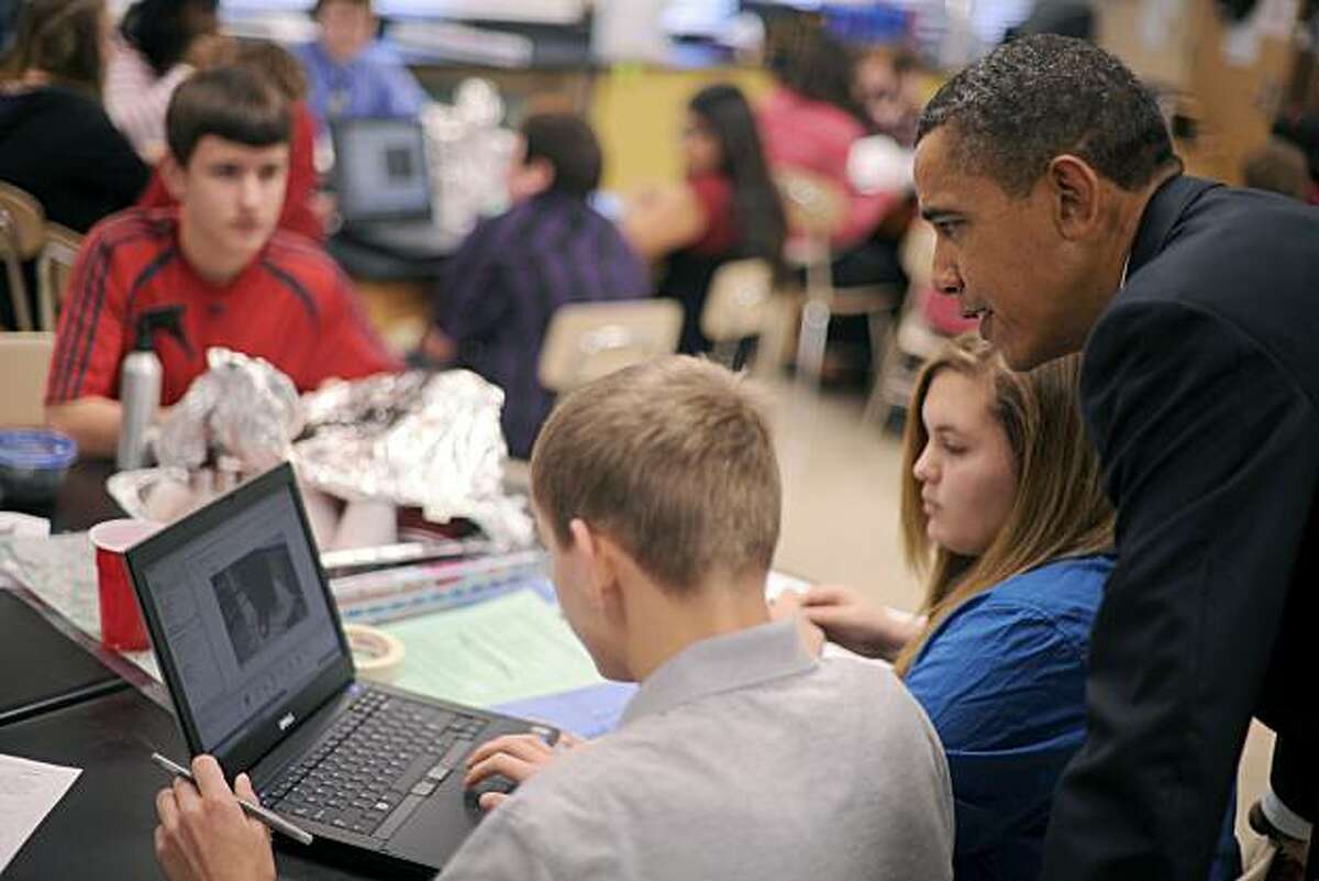 US President Barack Obama tours a science class during a visit to Parkville Middle School and Center of Technology on Feburary 14, 2011 in Baltimore, Maryland.