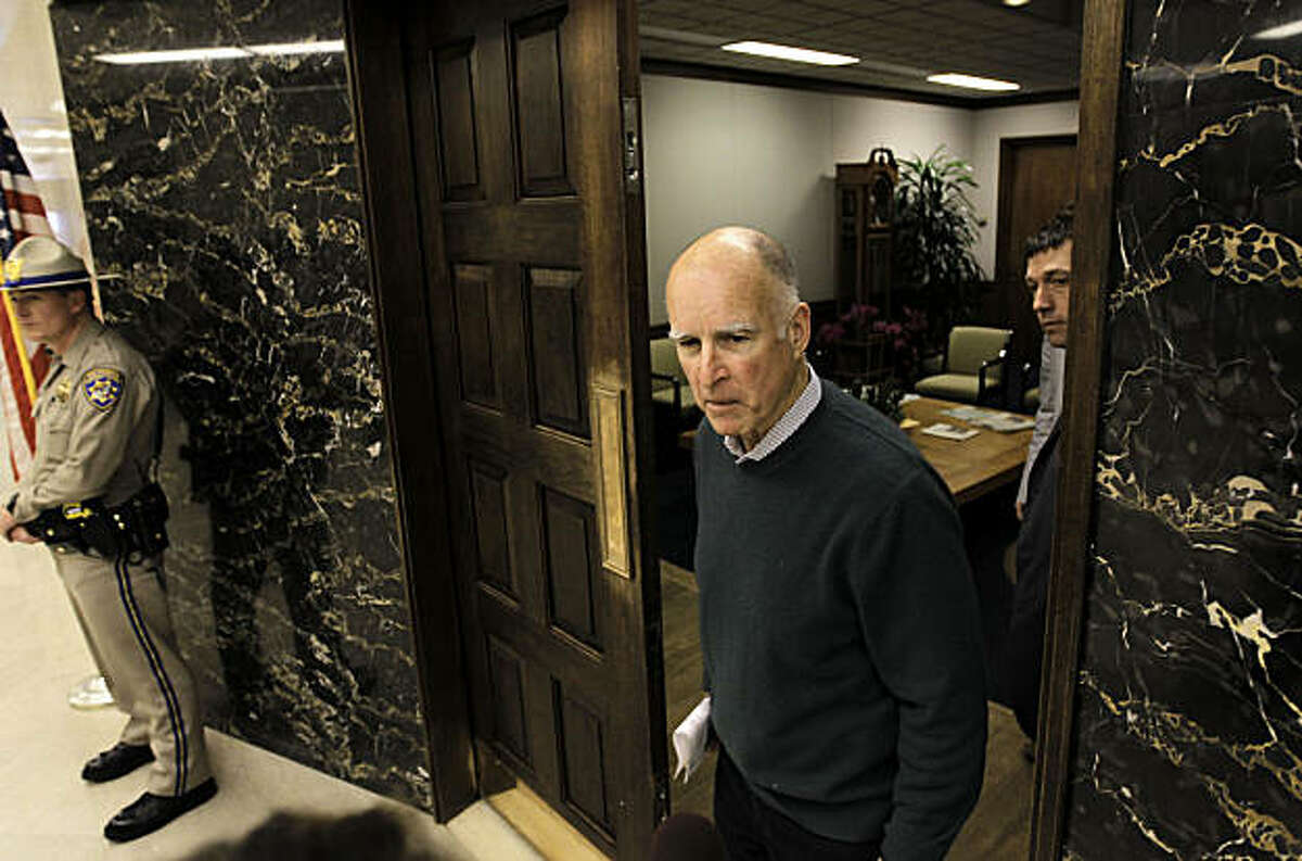 Governor Jerry Brown, at the front entrance of his new office at the State Capital building in Sacramento, Ca., on Friday Jan. 28, 2011. Governor Brown is settling into his new office in the Capital building.