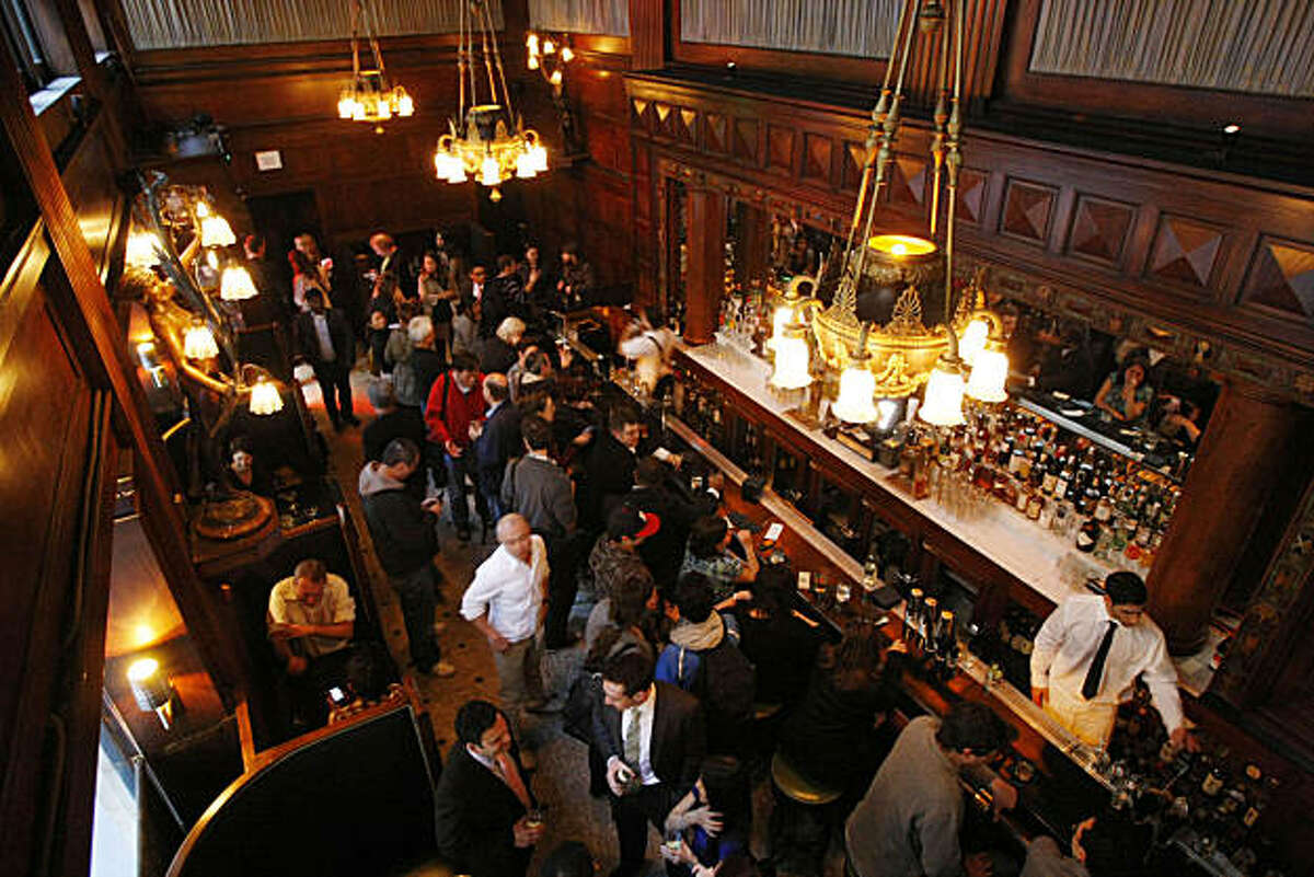 Patrons engage in drinks and conversation at House of Shields bar in San Francisco Calif. on Friday, Jan. 21, 2011. The bar recently underwent a change of hands and thorough cleaning to restore it back to its 1918 appearance.