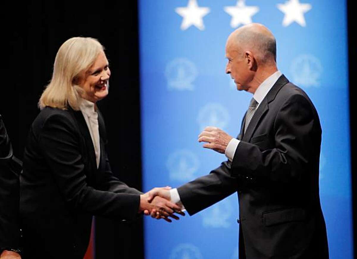 Gubernatorial candidates Jerry Brown and Meg Whitman shake hands before their debate at Dominican University in San Rafael on Tuesday.